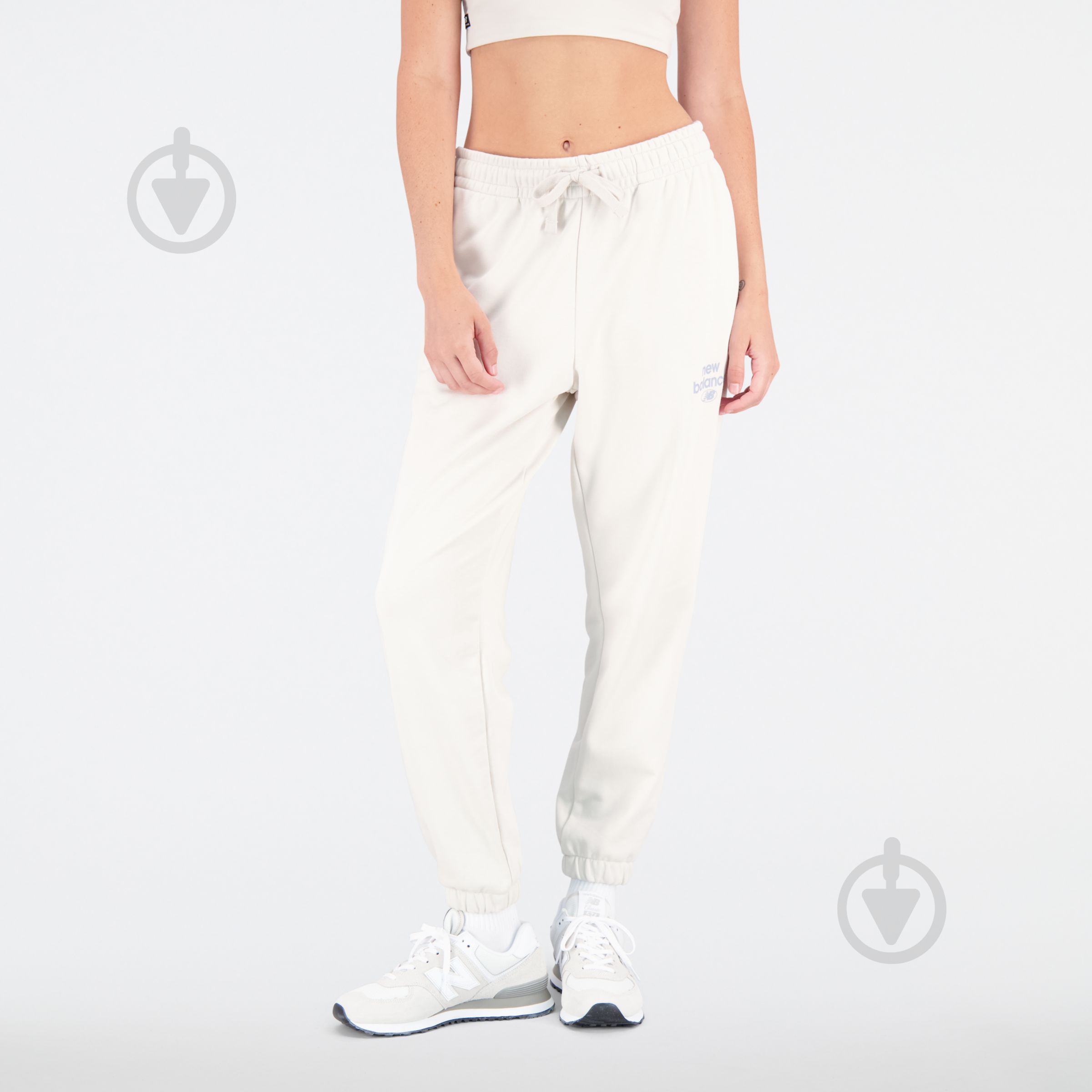 Штани New Balance ESSENTIALS REIMAGINED ARCH WP31508MBM р. L бежевий - фото 2