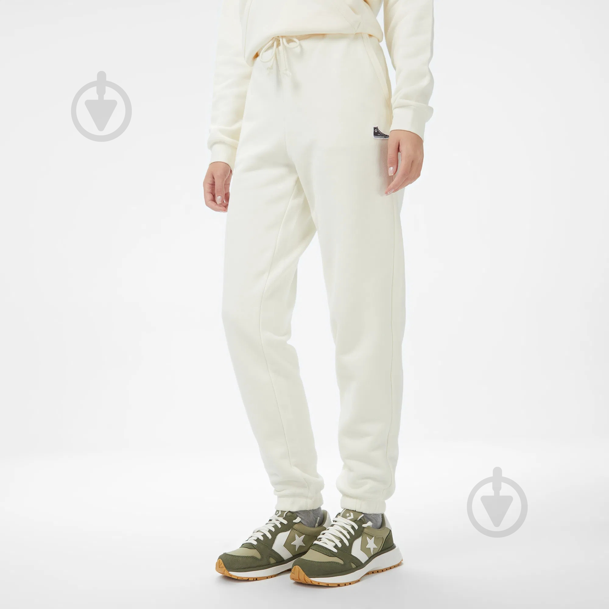 Брюки Converse SNEAKER PATCH PANT CVW5B124-EG7 р. M бежевый - фото 1 Брюки Converse SNEAKER PATCH PANT CVW5B124-EG7 р. M бежевый - фото 1