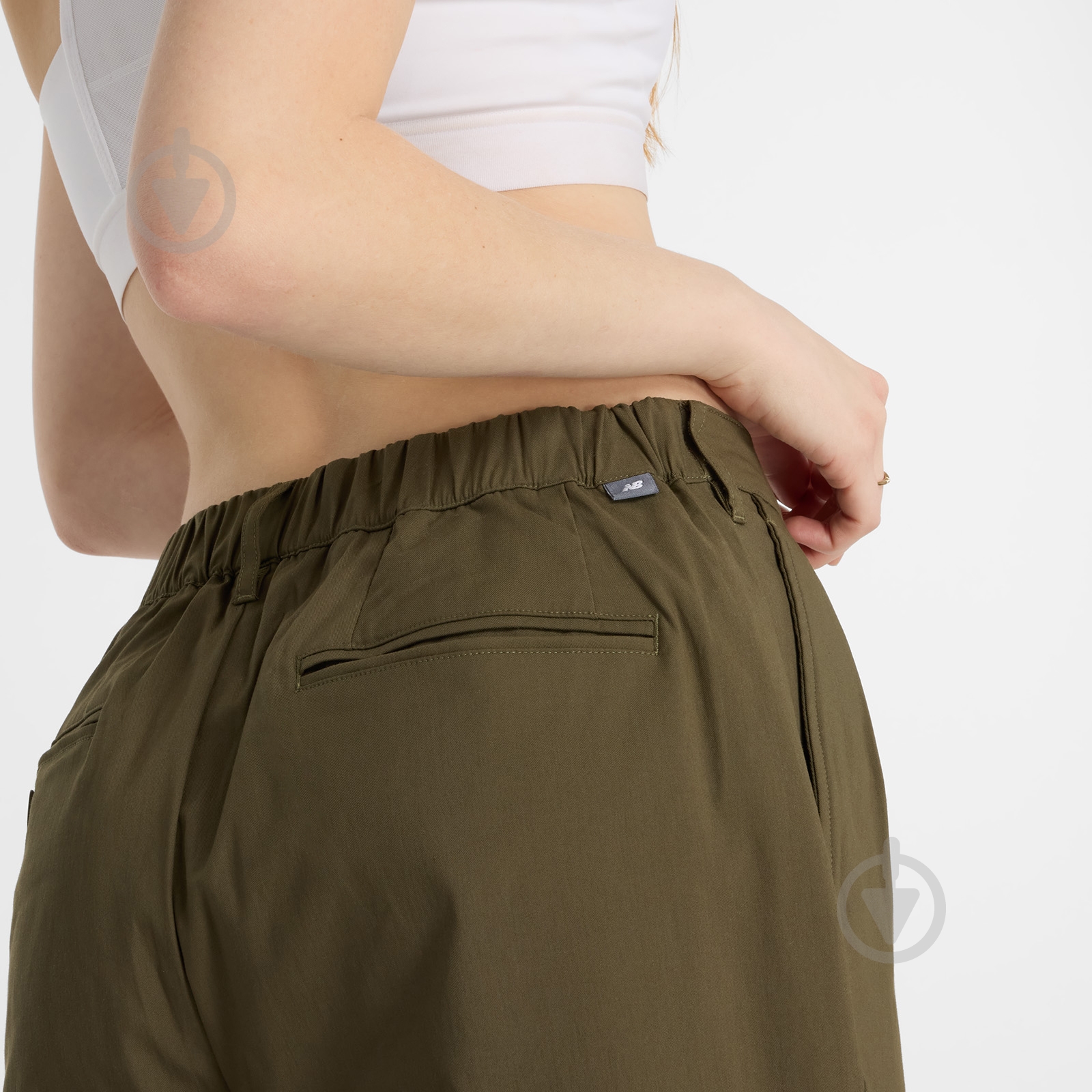 Брюки New Balance Boylston Twill Tapered WP43536DMO р. XS хаки - фото 4