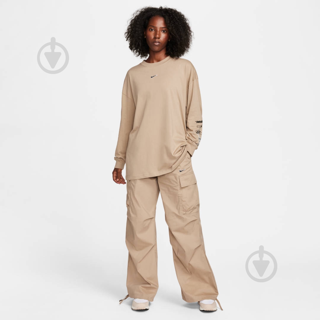 Футболка Nike W NSW LS TEE BF PRINT SW FV4971-247 р.M бежевый - фото 7 Футболка Nike W NSW LS TEE BF PRINT SW FV4971-247 р.M бежевый - фото 7