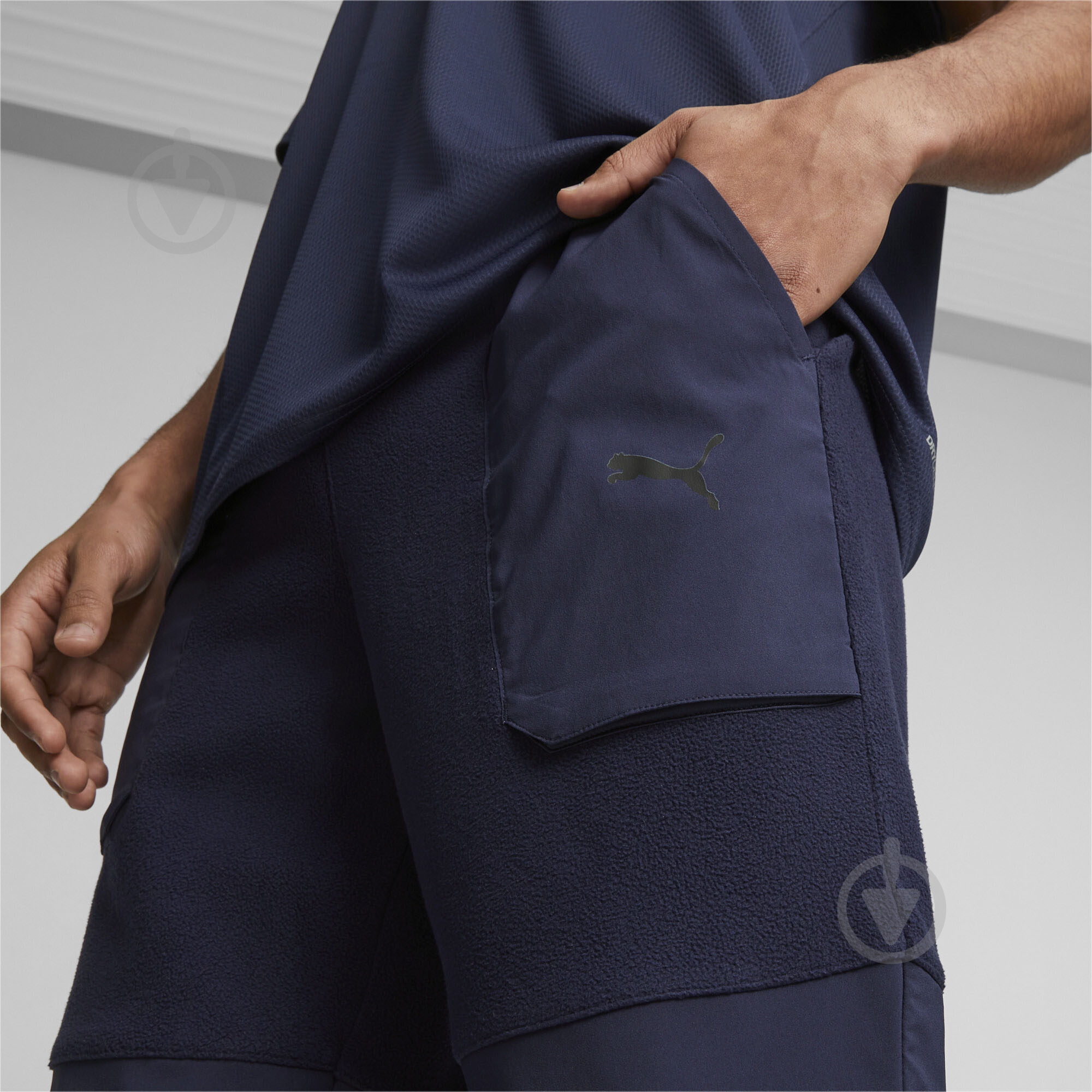 Брюки Puma PUMA FIT HYBRID POLAR FLEECE/WOVEN PANT 52388906 р. M синий - фото 4 Брюки Puma PUMA FIT HYBRID POLAR FLEECE/WOVEN PANT 52388906 р. M синий - фото 4