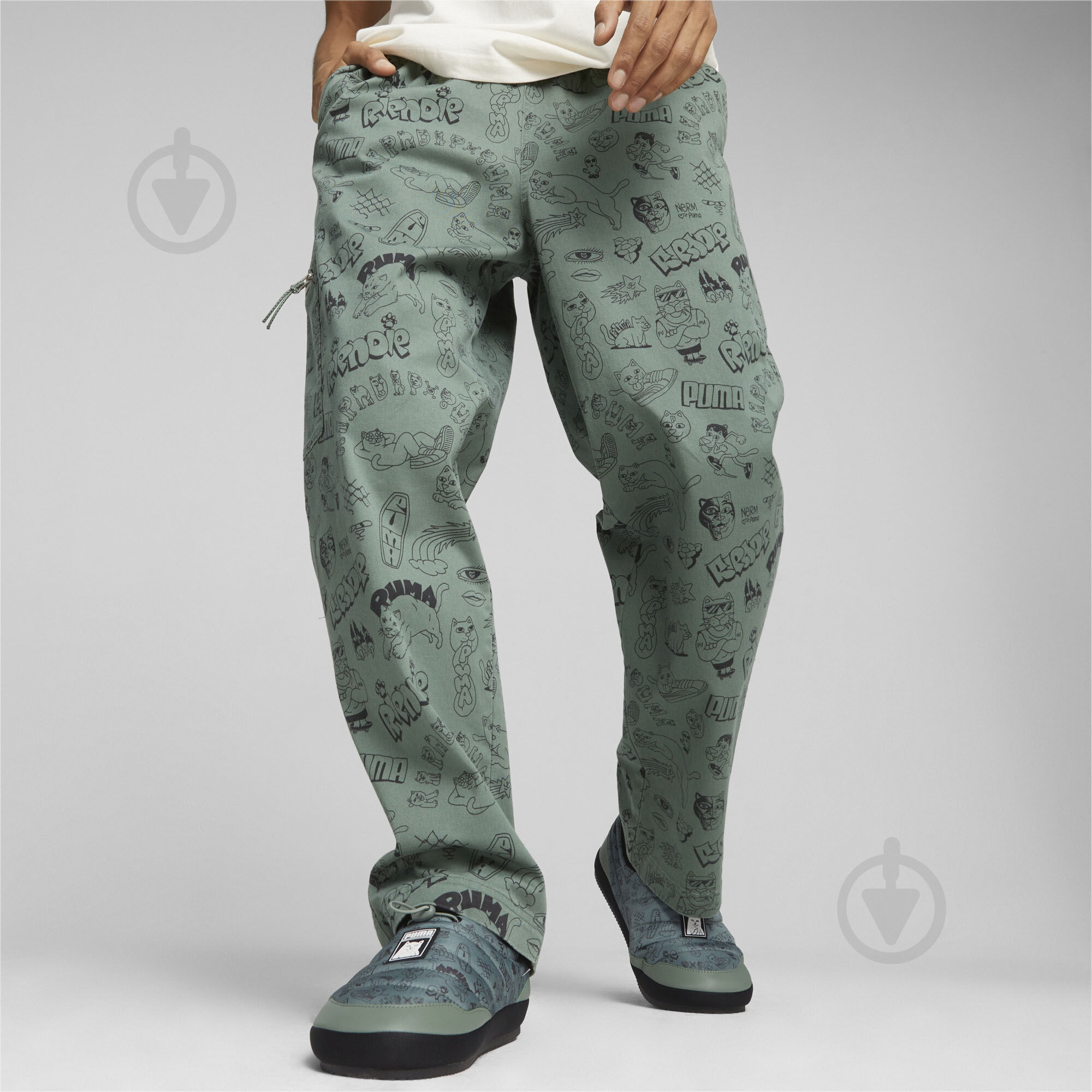 Штани Puma PUMA X RIPNDIP AOP TWILL PANTS 62220044 р. M зелений - фото 3