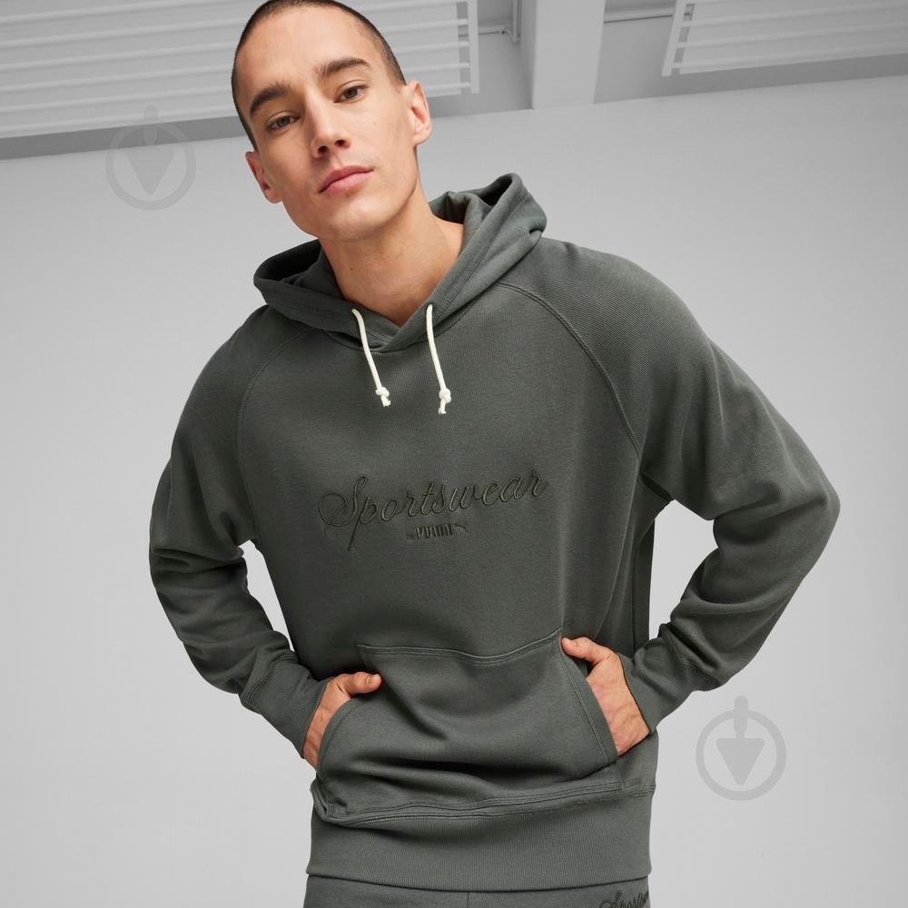 Джемпер Puma CLASSICS+ HOODIE 62427580 р.M серый - фото 2 Джемпер Puma CLASSICS+ HOODIE 62427580 р.M серый - фото 2