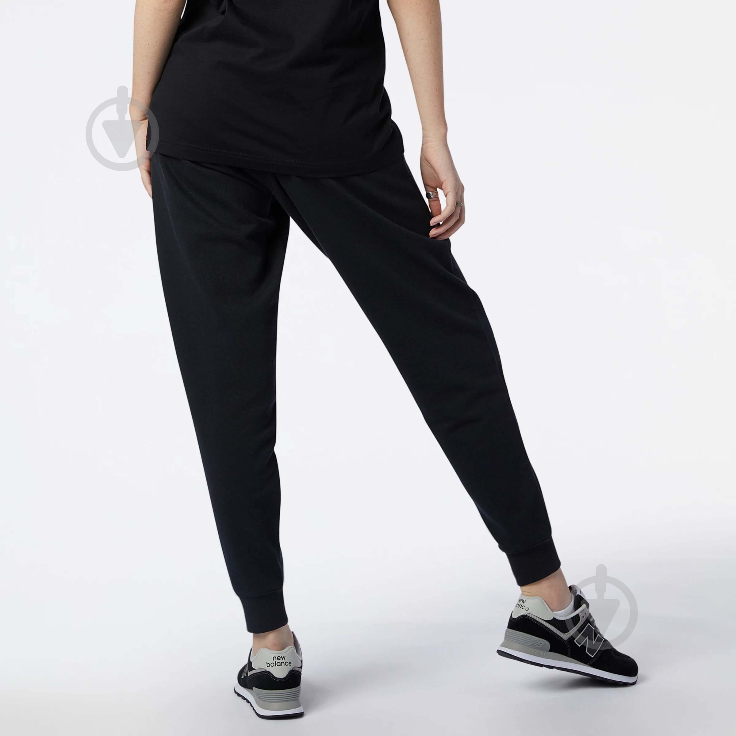 Штани New Balance MP11590BK р. L чорний - фото 3