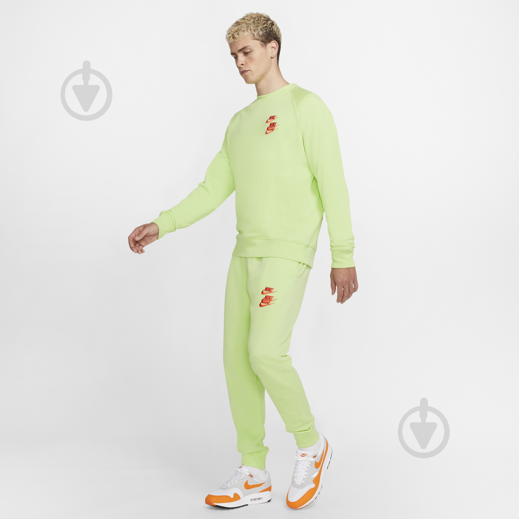 Брюки Nike M NSW CF FT PANT WTOUR DD0884-383 р. M салатовый - фото 1