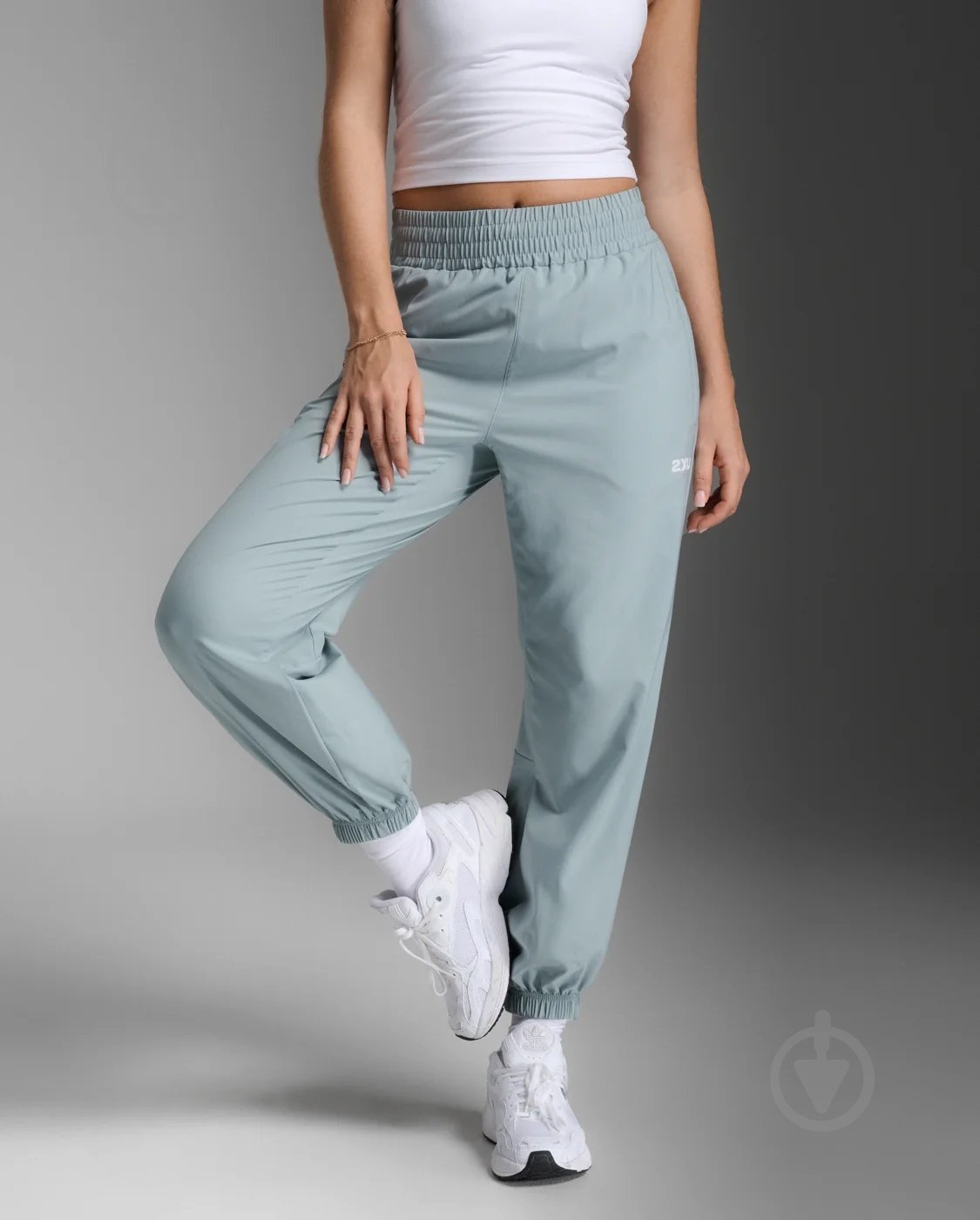 Штани 2XU Aero Hi-Rise Woven Jogger WR7206b_SMB/WRF р. L блакитний - фото 1