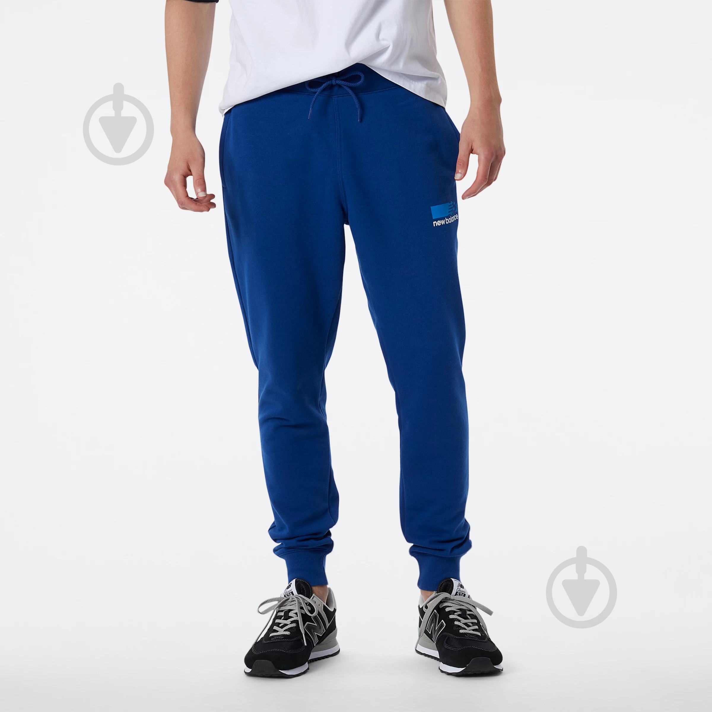 Брюки New Balance MP13900AT р. L синий - фото 1