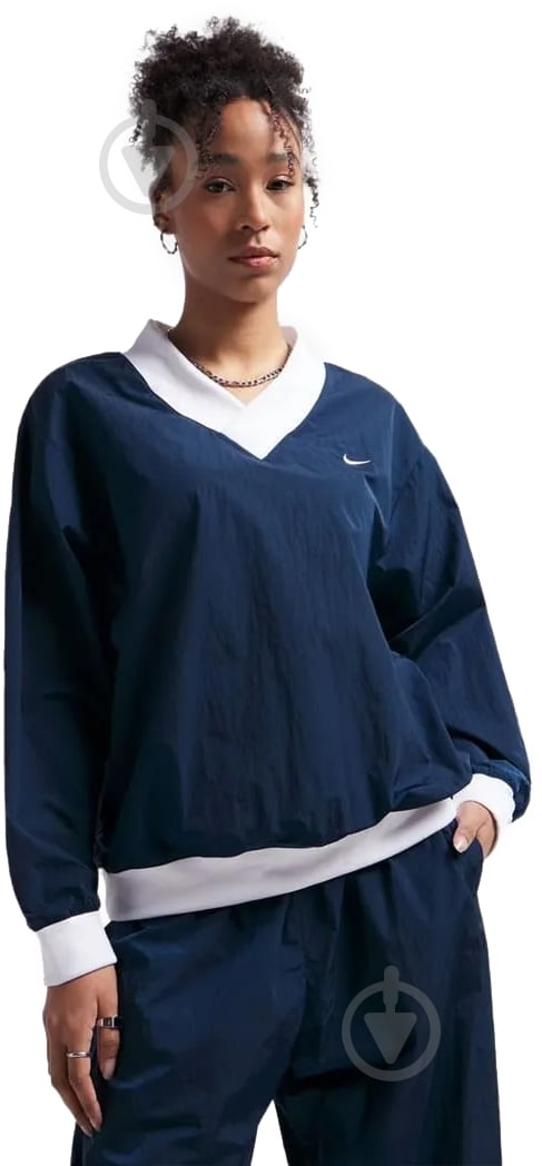 Свитшот Nike W NSW ESSTL WVN UV LS VNCK CRW FV7649-480 р.XS синий - фото 1 Свитшот Nike W NSW ESSTL WVN UV LS VNCK CRW FV7649-480 р.XS синий - фото 1