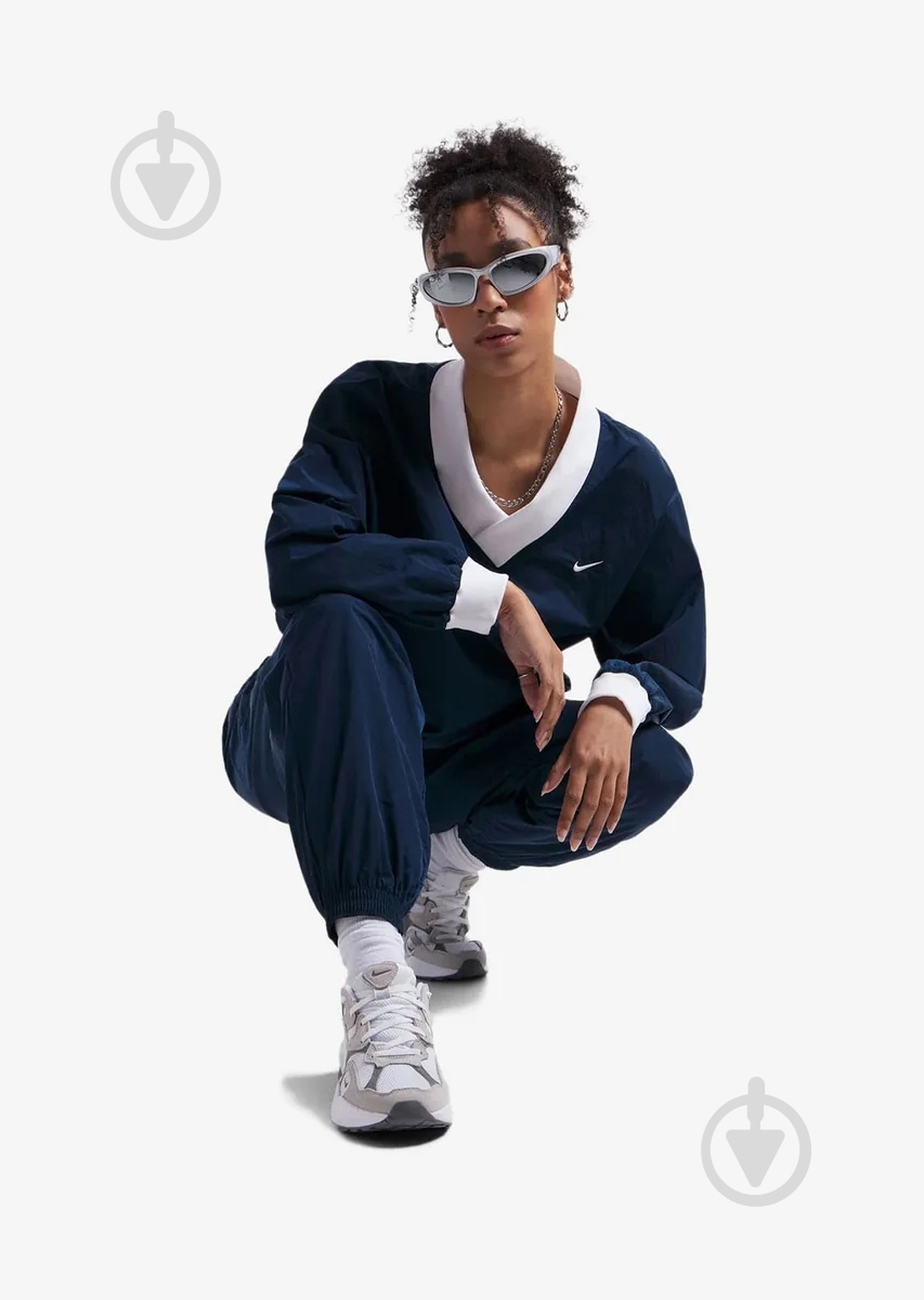 Свитшот Nike W NSW ESSTL WVN UV LS VNCK CRW FV7649-480 р.XS синий - фото 4 Свитшот Nike W NSW ESSTL WVN UV LS VNCK CRW FV7649-480 р.XS синий - фото 4