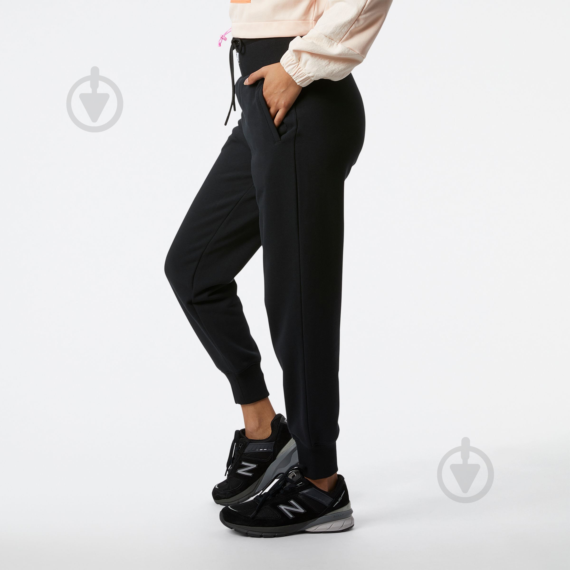 Штани New Balance WP21503BK р. L чорний - фото 2