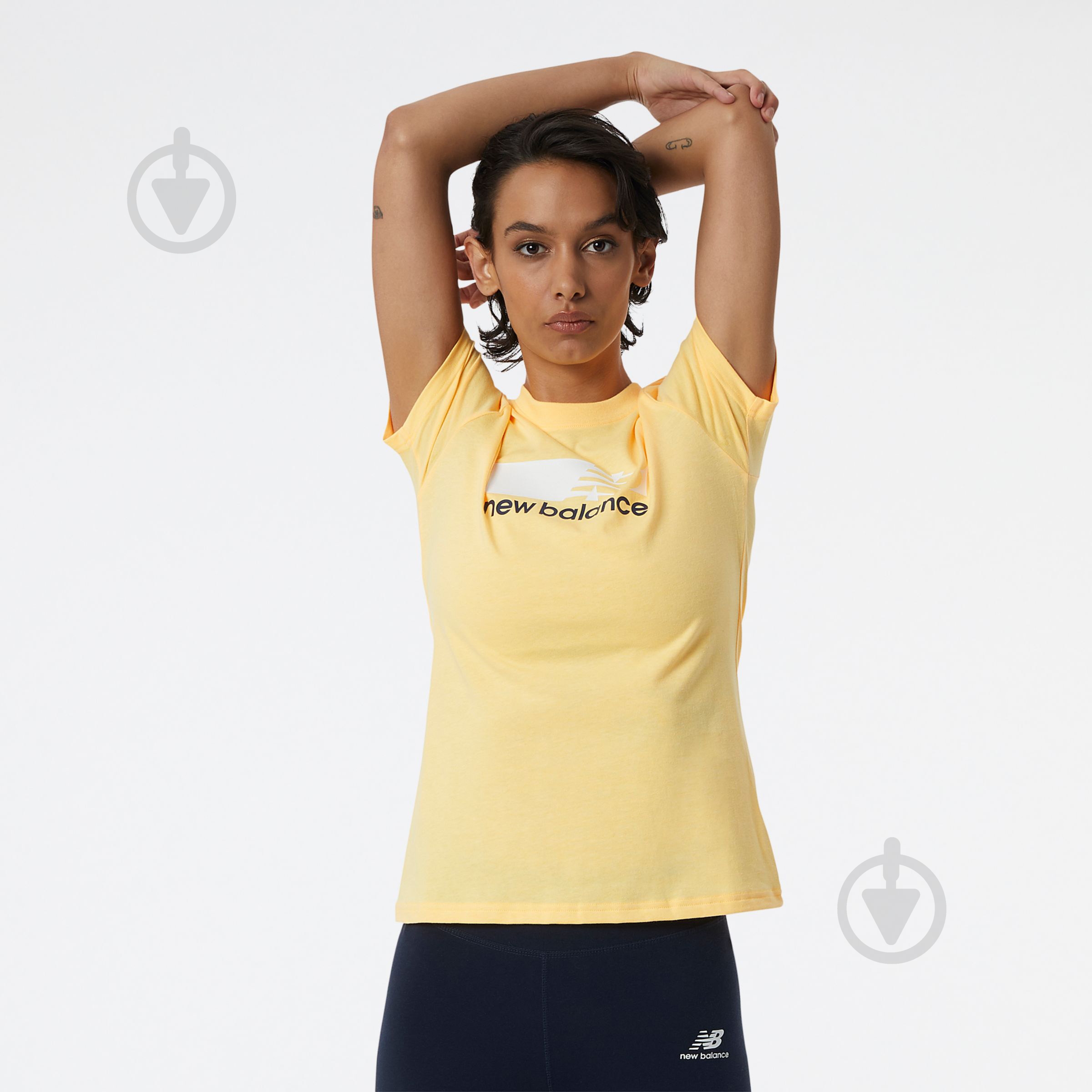 Футболка New Balance WT13800VAC р.XS помаранчевий - фото 1