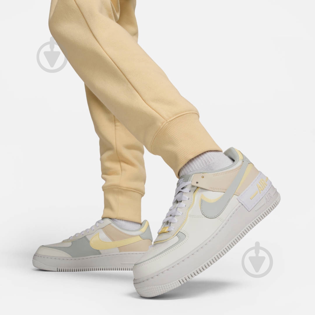 Брюки Nike FD0893-294 р. M бежевый - фото 5
