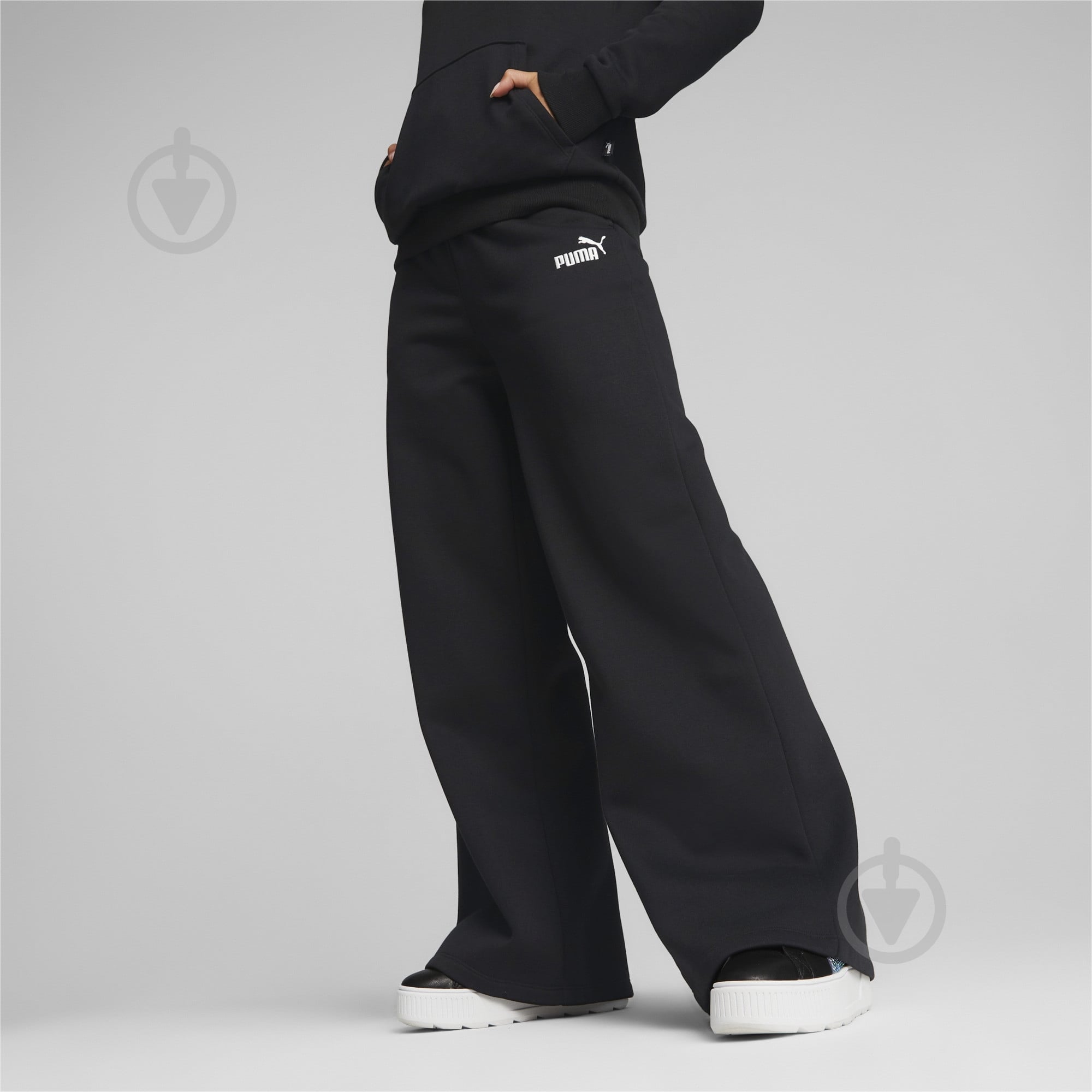 Брюки Puma ESS+ EMBROIDERY WIDE PANTS FL 67000601 р. XS черный - фото 3 Брюки Puma ESS+ EMBROIDERY WIDE PANTS FL 67000601 р. XS черный - фото 3