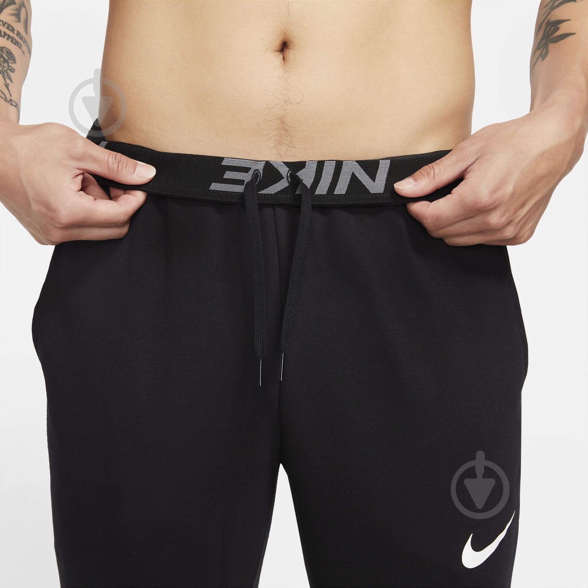 Брюки Nike DF PNT TAPER FL CZ6379-010 р. S черный - фото 4