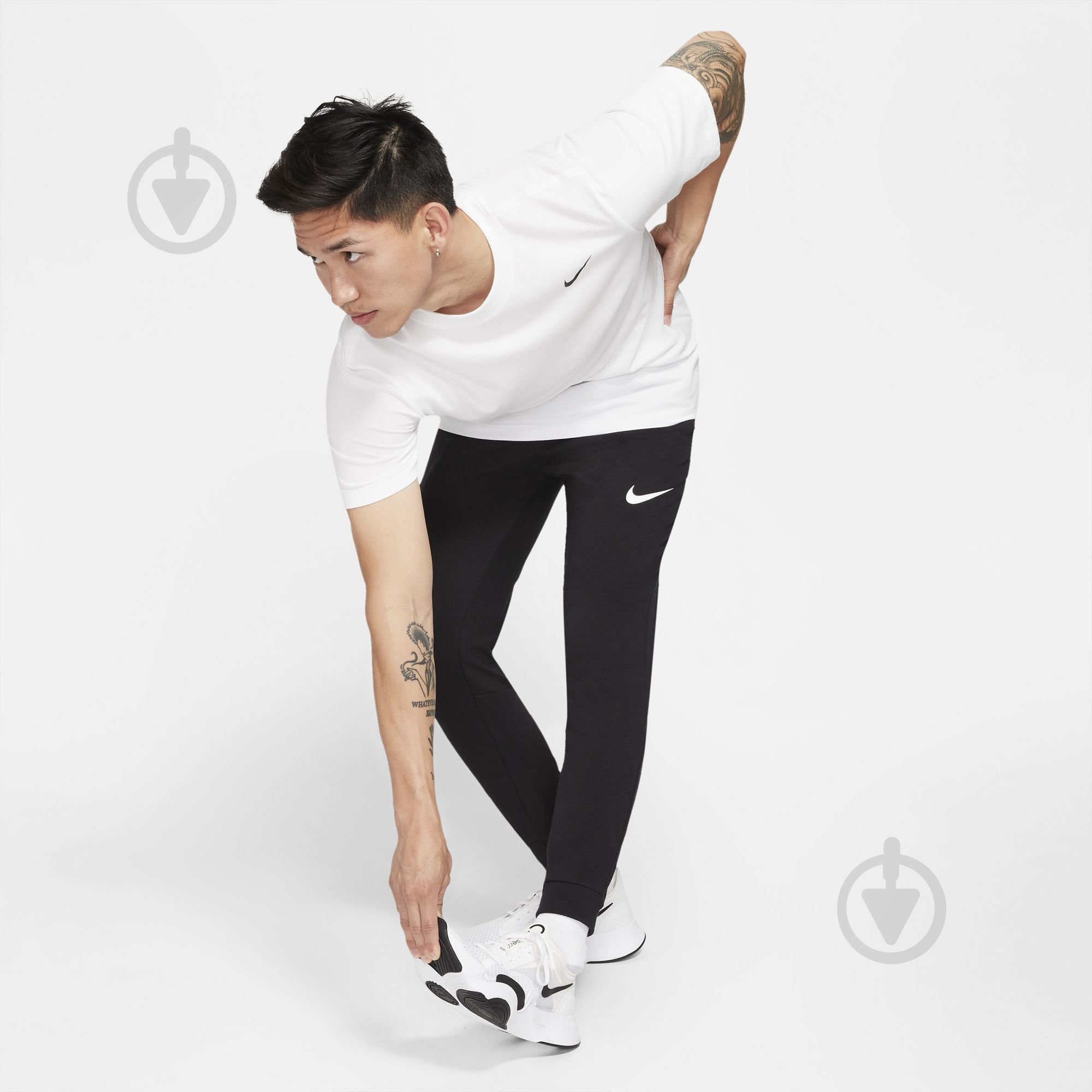 Брюки Nike DF PNT TAPER FL CZ6379-010 р. S черный - фото 6