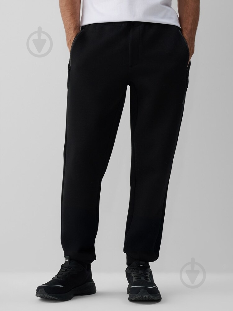 Штани 4F TROUSERS CAS 4FRAW26TTROM2083-20S р. L чорний - фото 1 Штани 4F TROUSERS CAS 4FRAW26TTROM2083-20S р. L чорний - фото 1