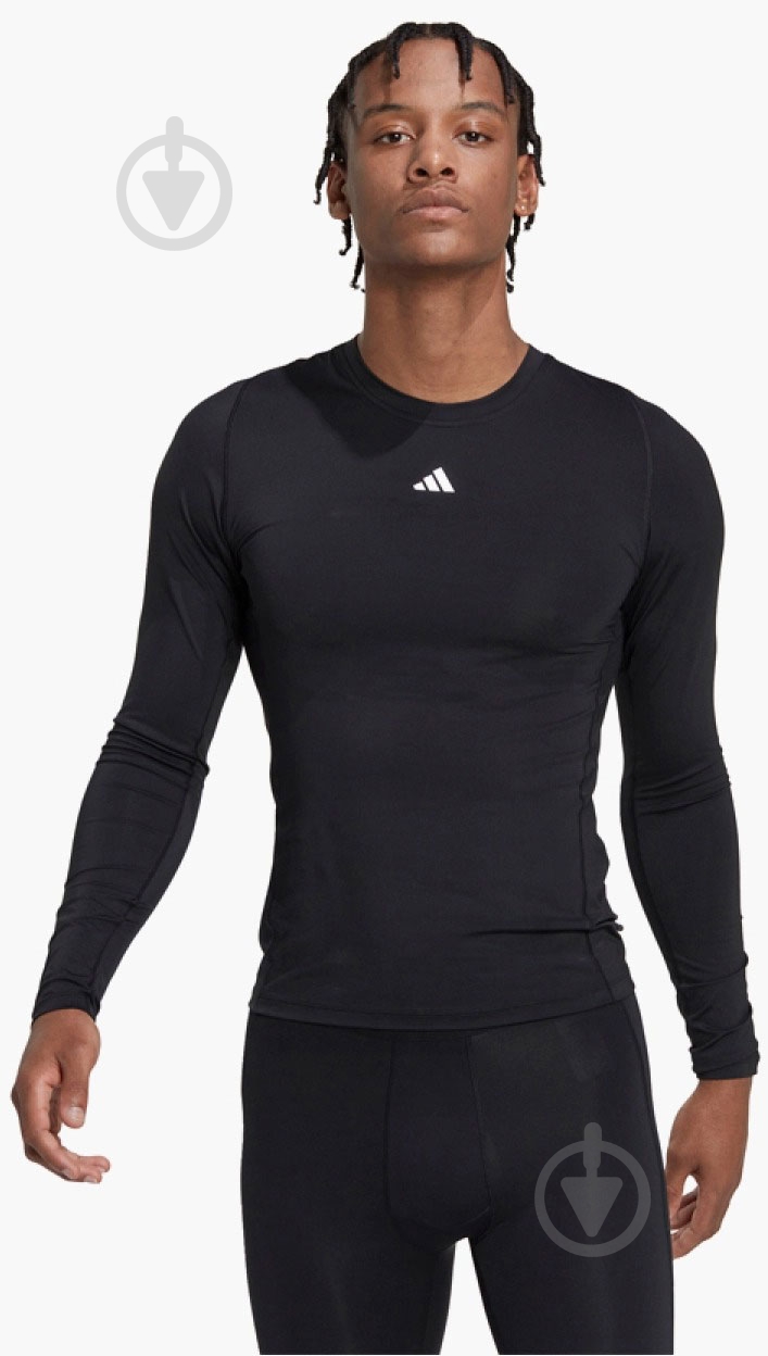Футболка Adidas HK2336 р.S черный - фото 1
