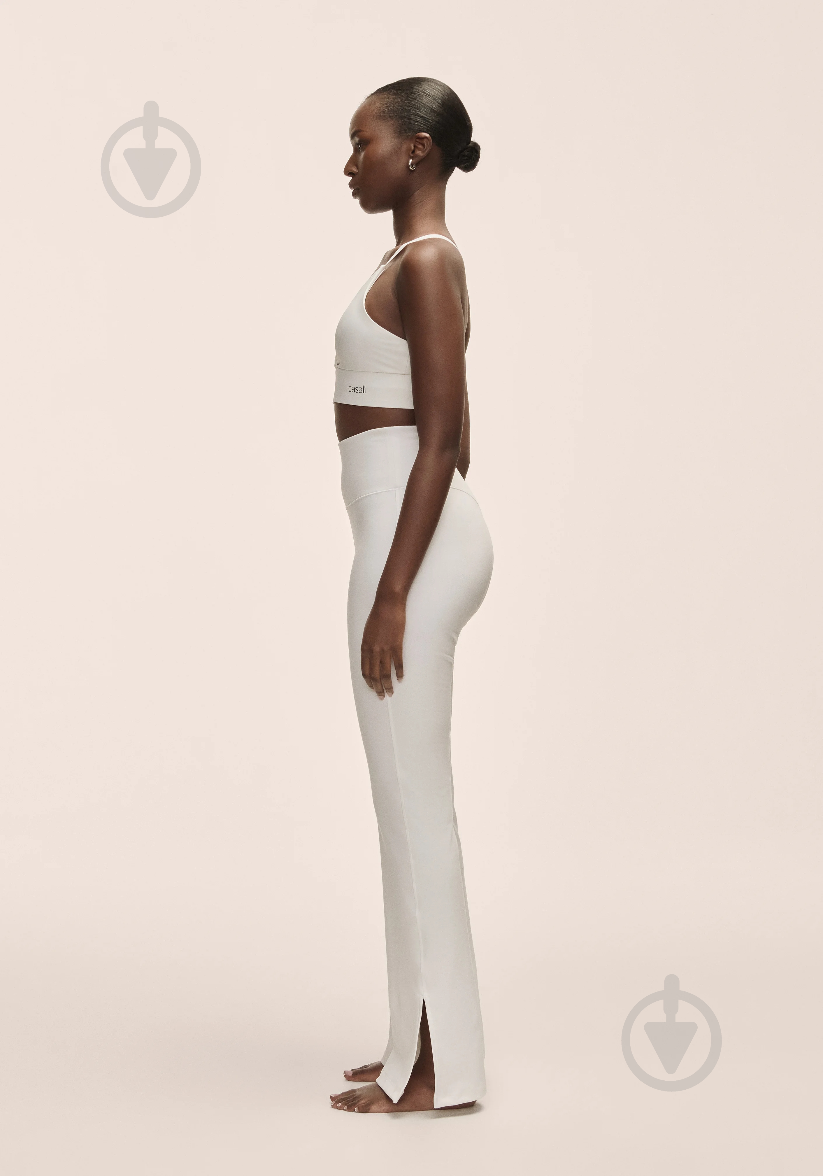 Штани Casall Grace Flare Slit Pant 25059-001 р. S білий - фото 4 Штани Casall Grace Flare Slit Pant 25059-001 р. S білий - фото 4