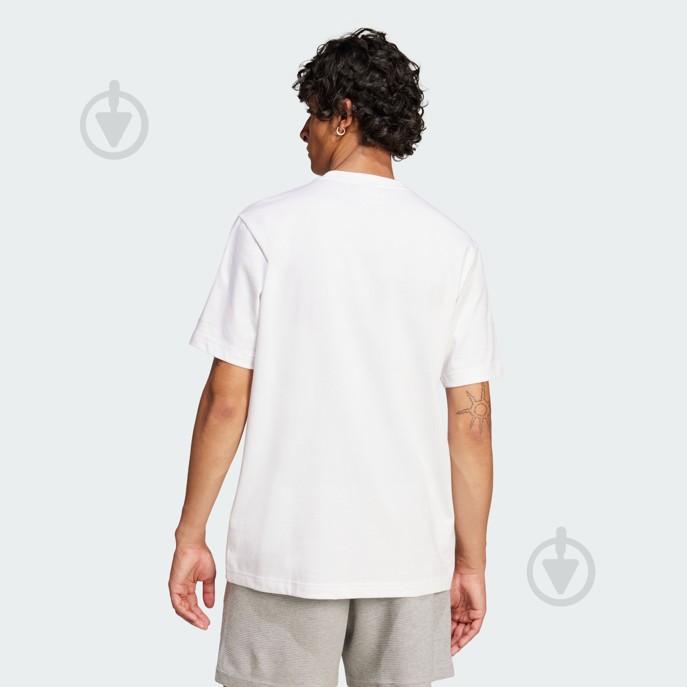Футболка Adidas GRFX TEE JC8365 р.M білий - фото 2