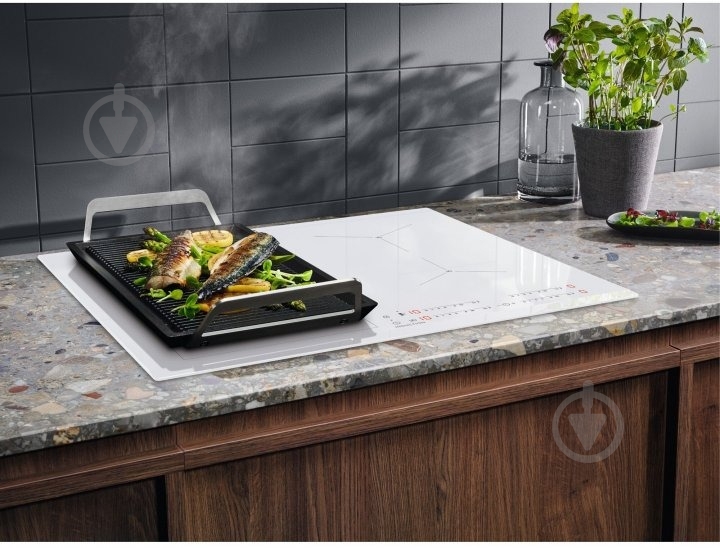Варочная поверхность электрическая Electrolux CIS62449W - фото 3 Варочная поверхность электрическая Electrolux CIS62449W - фото 3