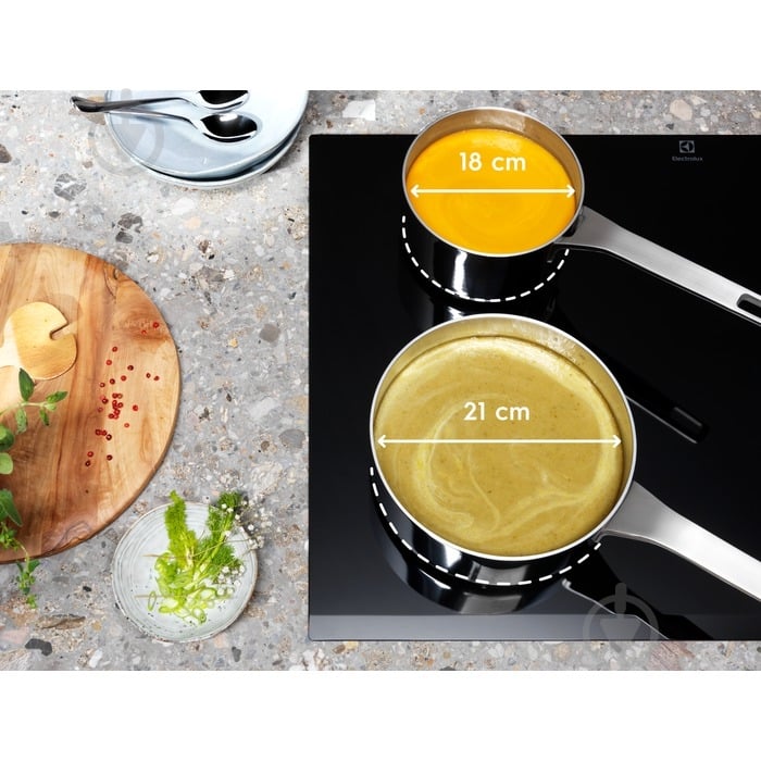 Варочная поверхность индукционная Electrolux LIV63431BK - фото 4