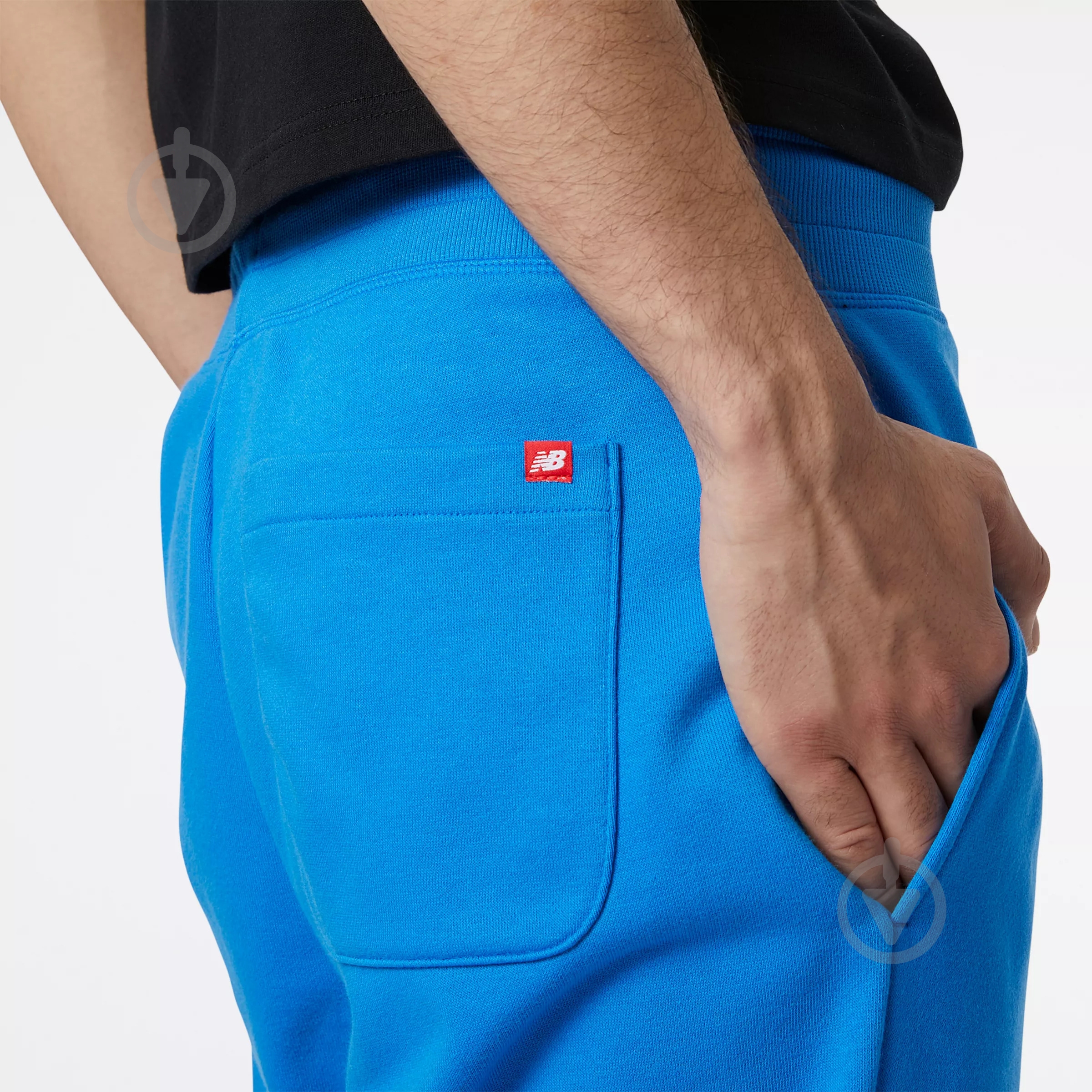 Брюки New Balance MP03558SBU р. S голубой - фото 4