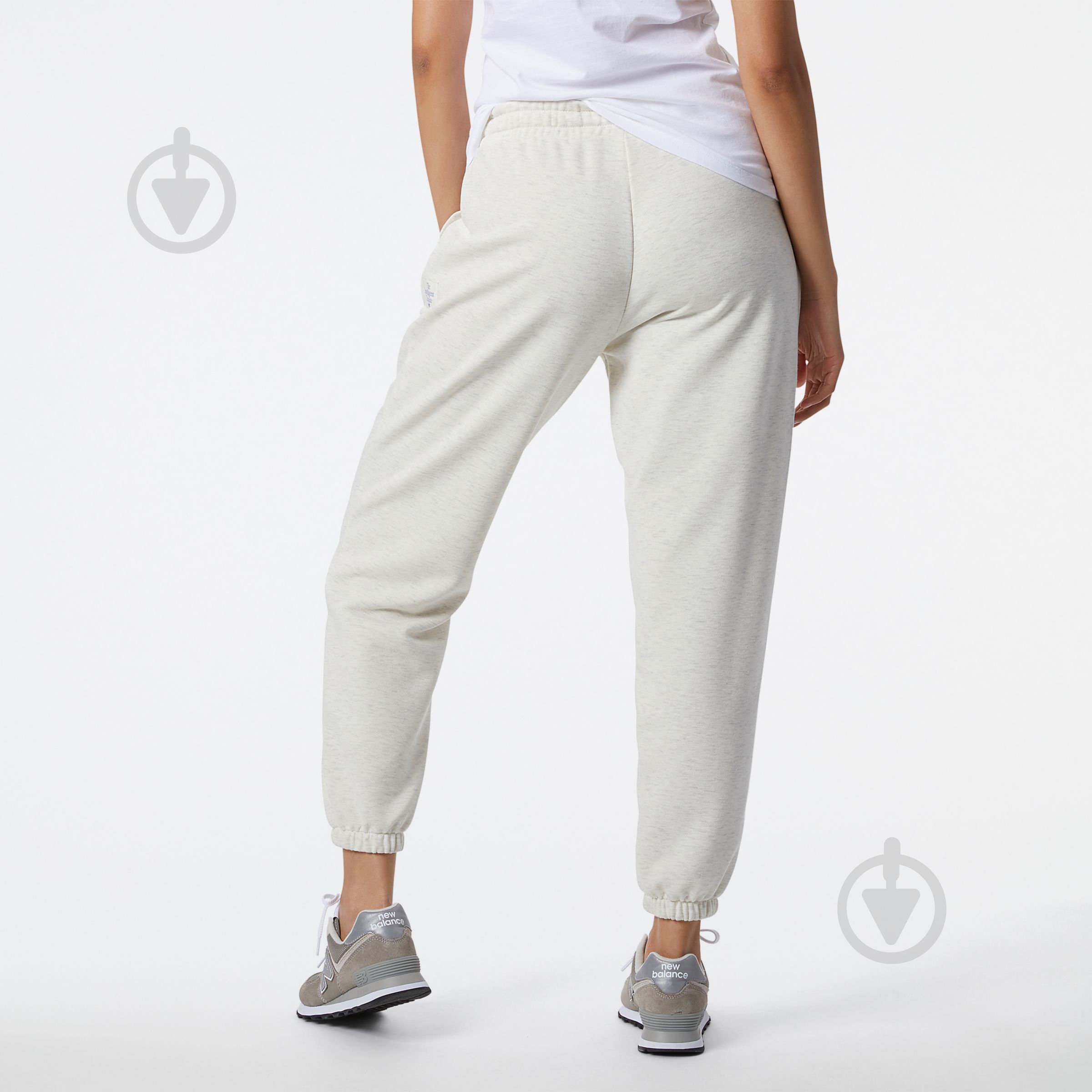 Штани New Balance WP21554SAH р. M білий - фото 3 Штани New Balance WP21554SAH р. M білий - фото 3