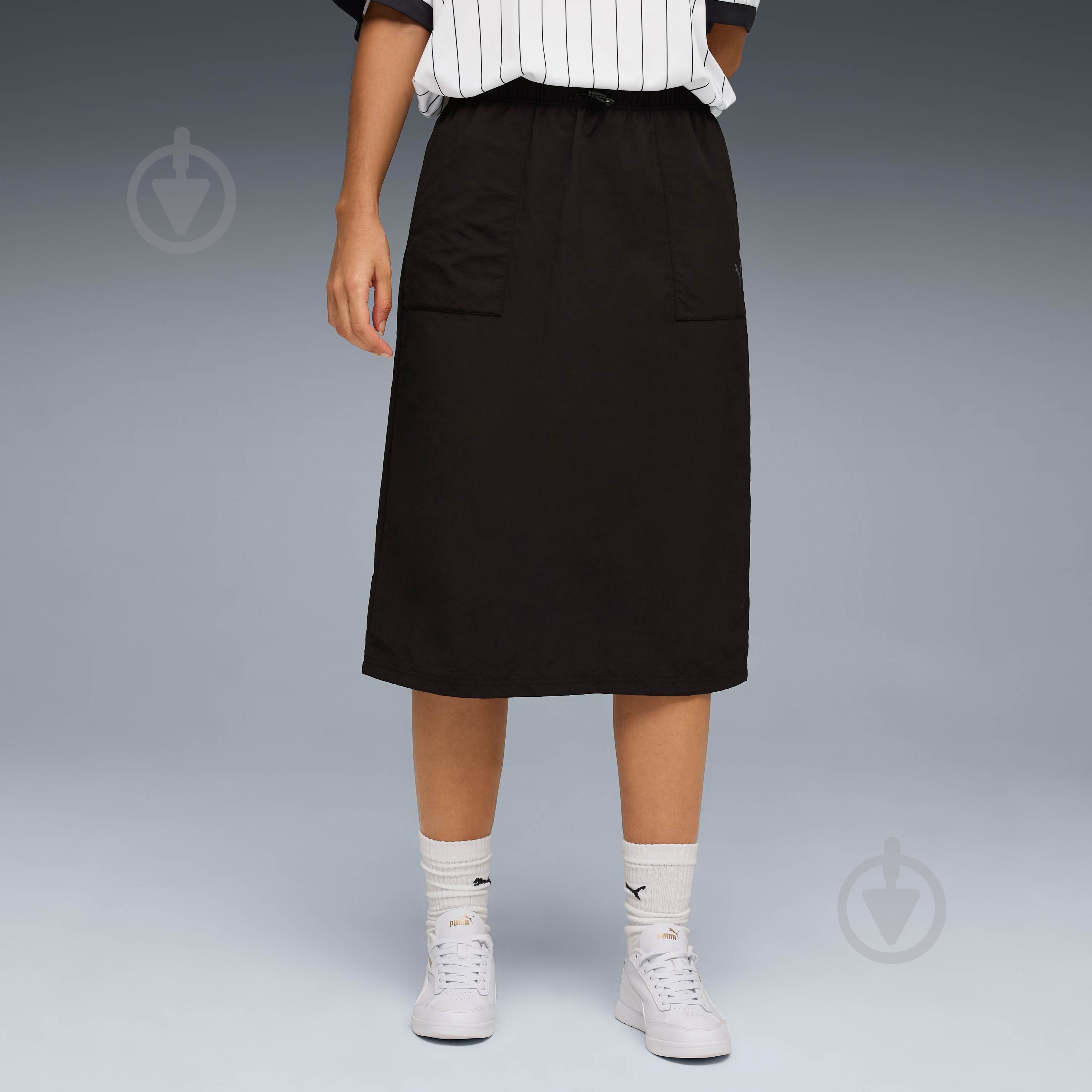 Спідниця Puma HER Comfort Woven High-Waist Skirt 68815501 р.S чорний - фото 1 Спідниця Puma HER Comfort Woven High-Waist Skirt 68815501 р.S чорний - фото 1