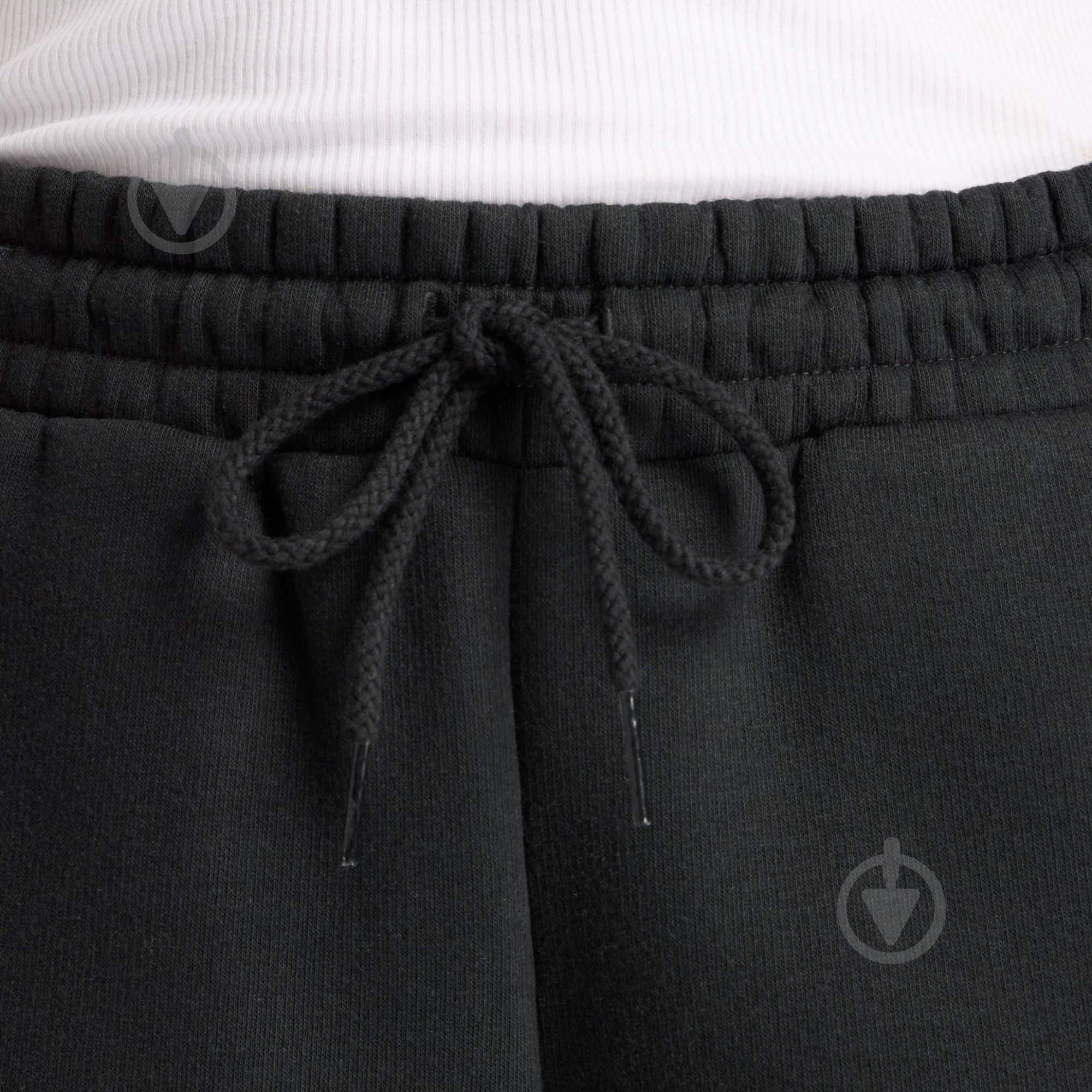 Штани New Balance WP53902BK р. L чорний - фото 4