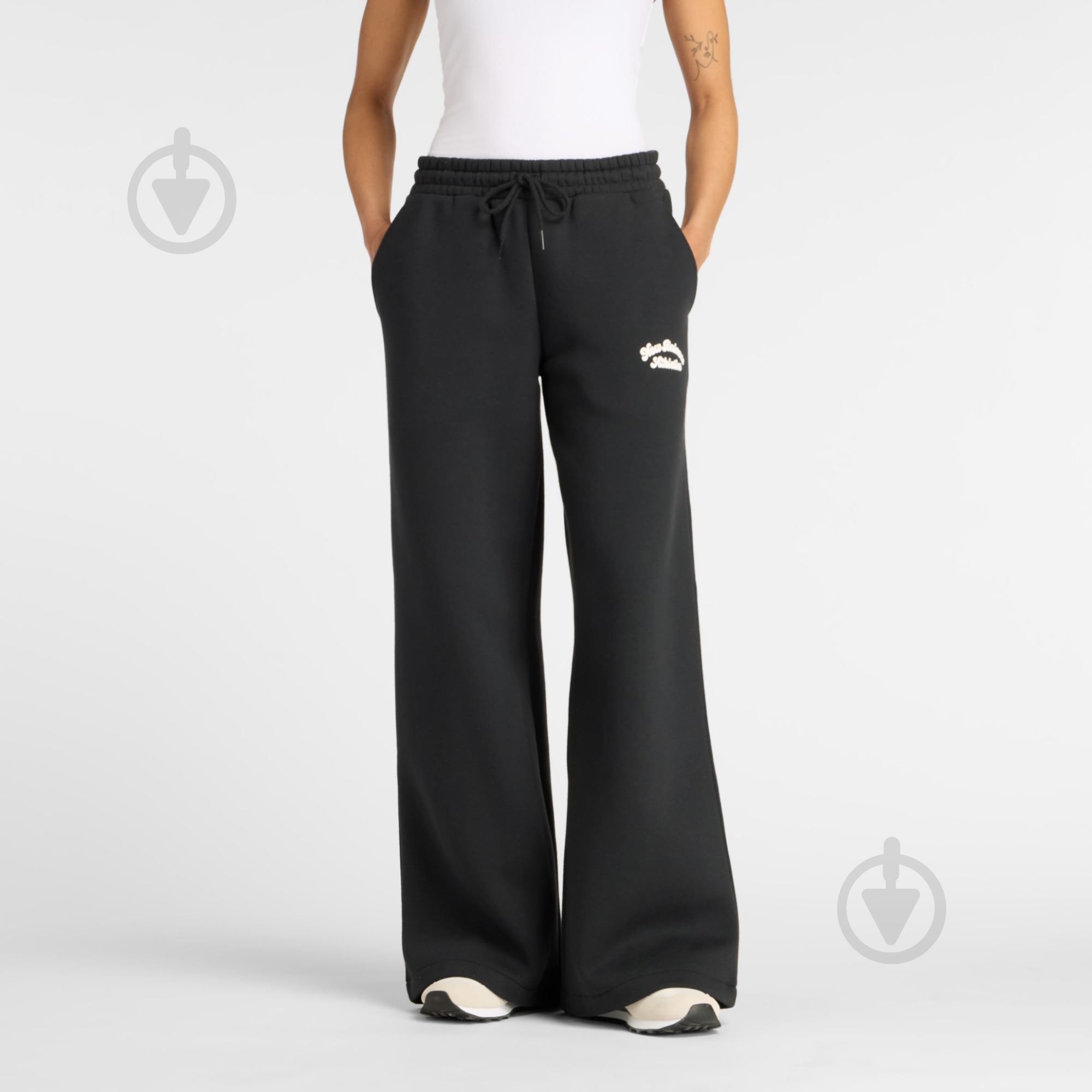 Штани New Balance WP53902BK р. XS чорний - фото 1