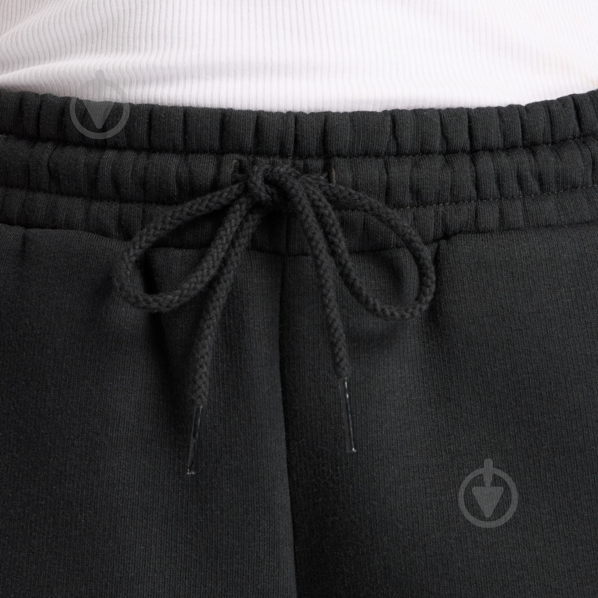 Штани New Balance WP53902BK р. XS чорний - фото 4