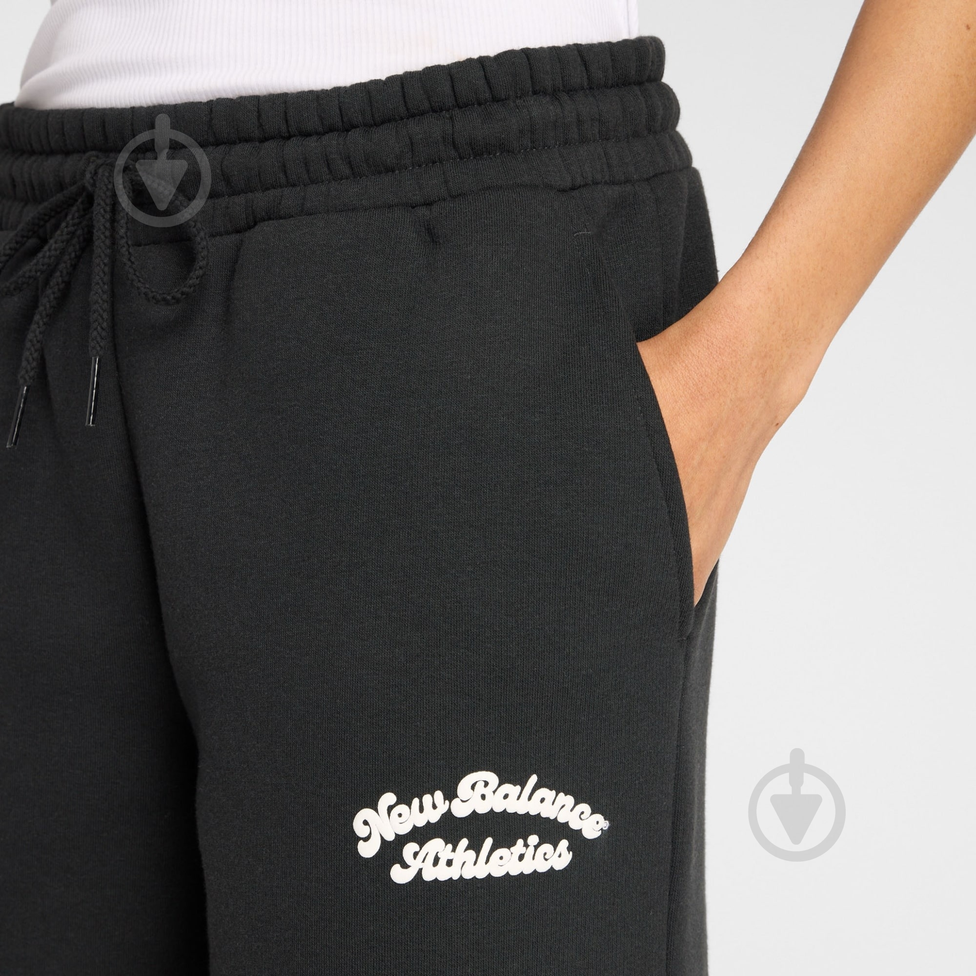 Штани New Balance WP53902BK р. XS чорний - фото 5