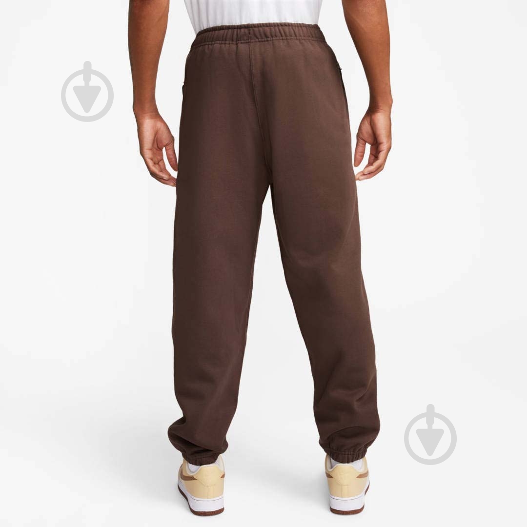 Штани Nike NK SOLO SWSH FLC CF PANT DX1364-237 р. S коричневий - фото 2