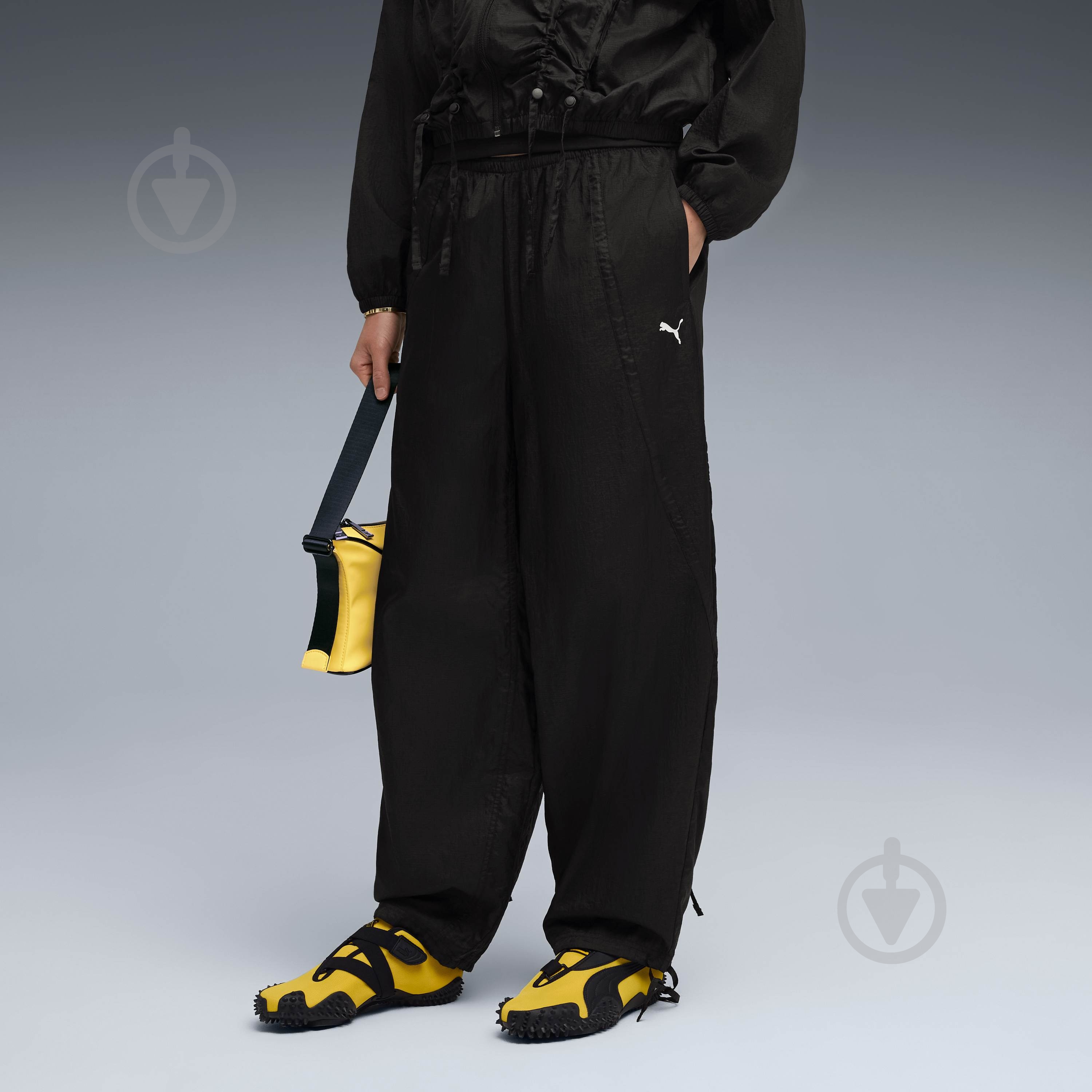 Штани Puma DARE TO Woven Pants 63214901 р. L чорний - фото 1