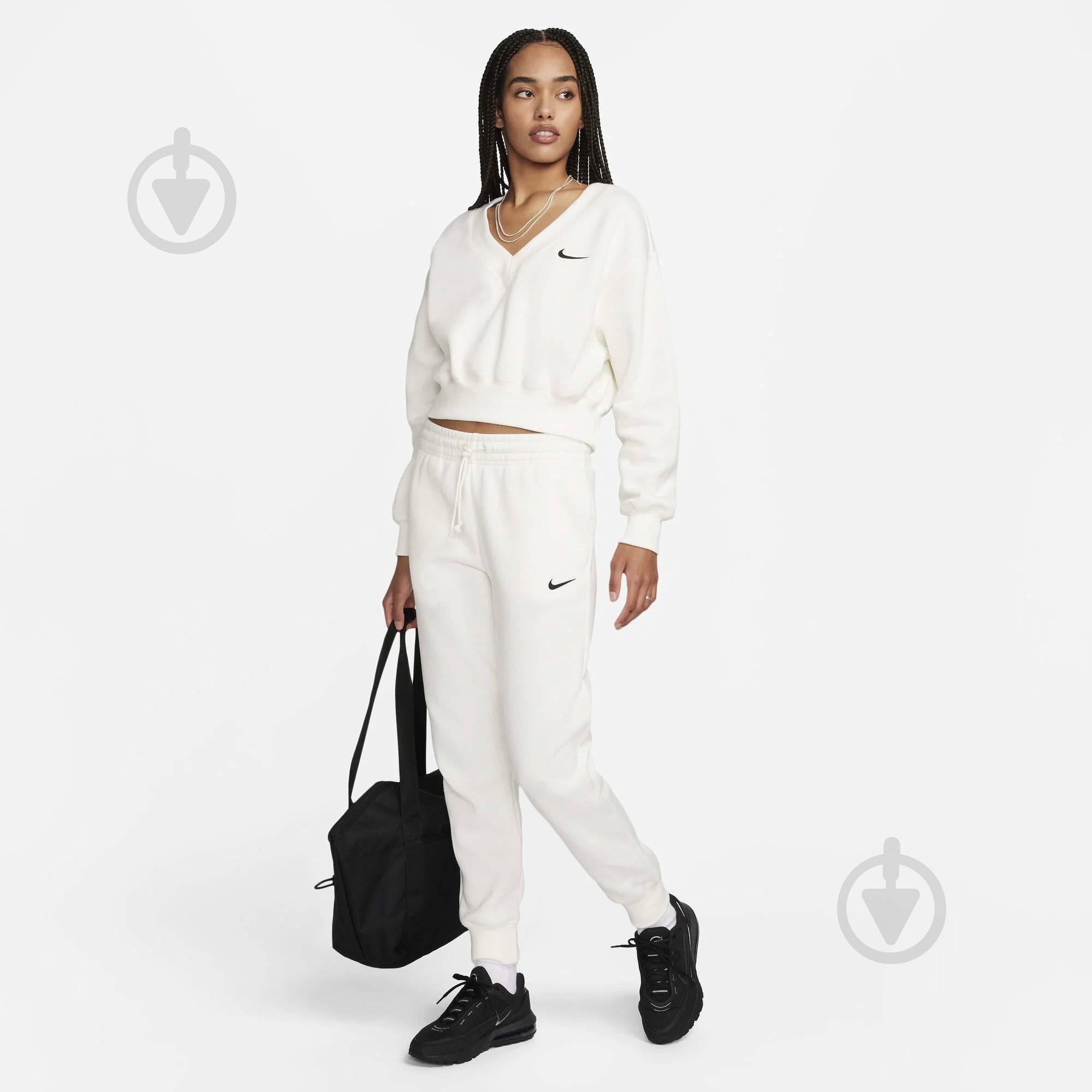 Штани Nike W NSW PHNX FLC MR PANT STD FZ7626-133 р. L бежевий - фото 8 Штани Nike W NSW PHNX FLC MR PANT STD FZ7626-133 р. L бежевий - фото 8