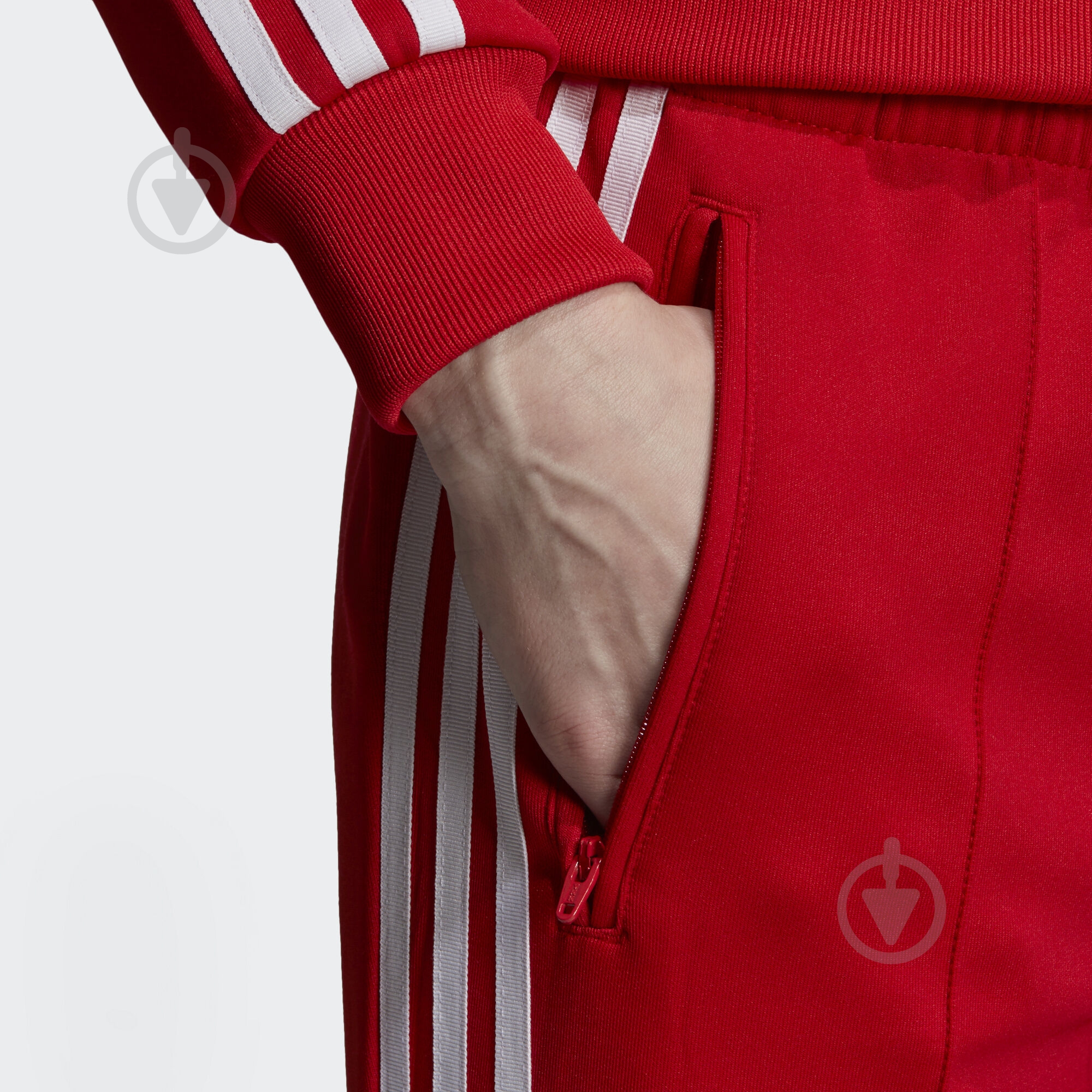 Брюки Adidas SST TP ED7575 р. 34 красный - фото 5