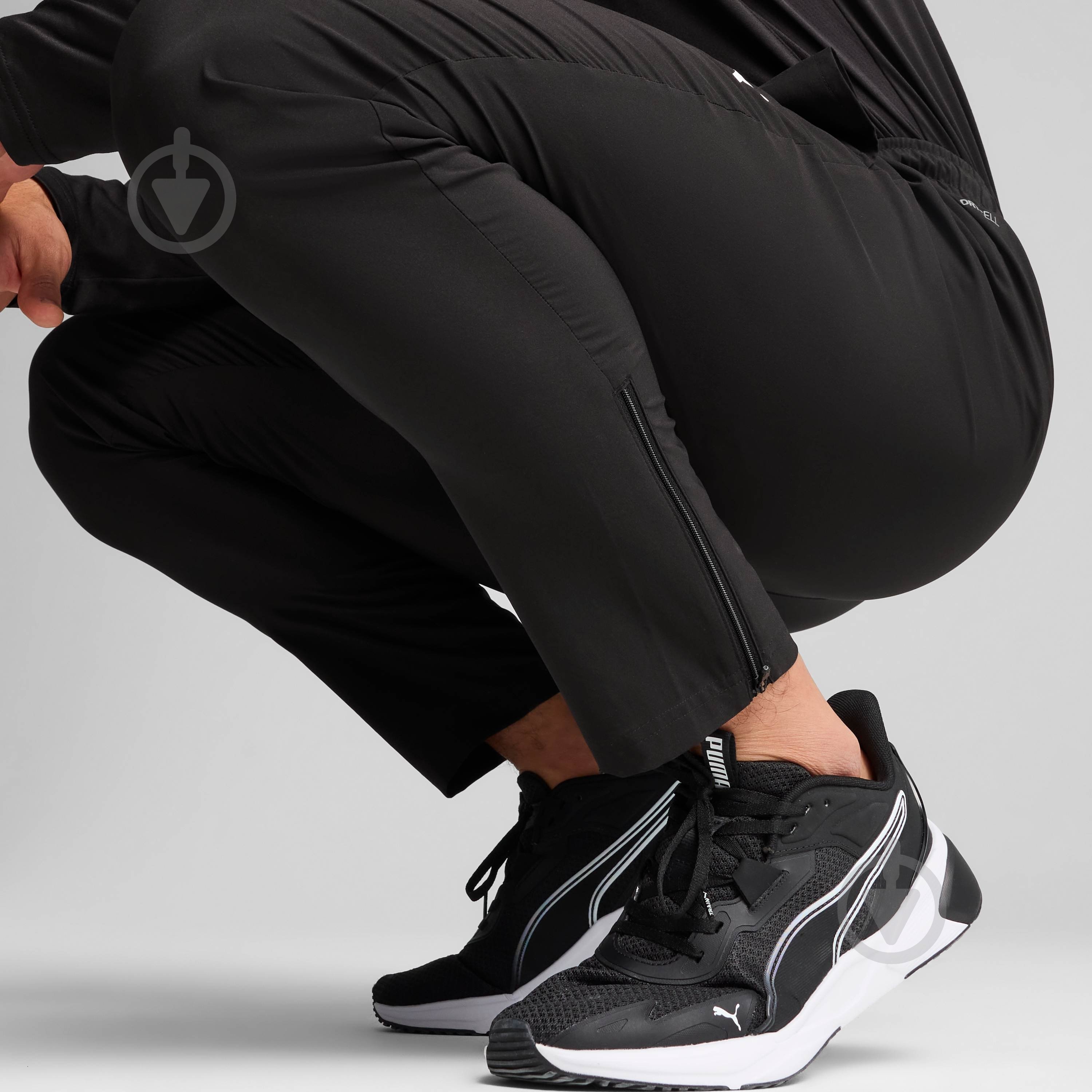 Штани Puma TAD ESSENTIALS Woven Tapered Pant 52591601 р. L чорний - фото 4