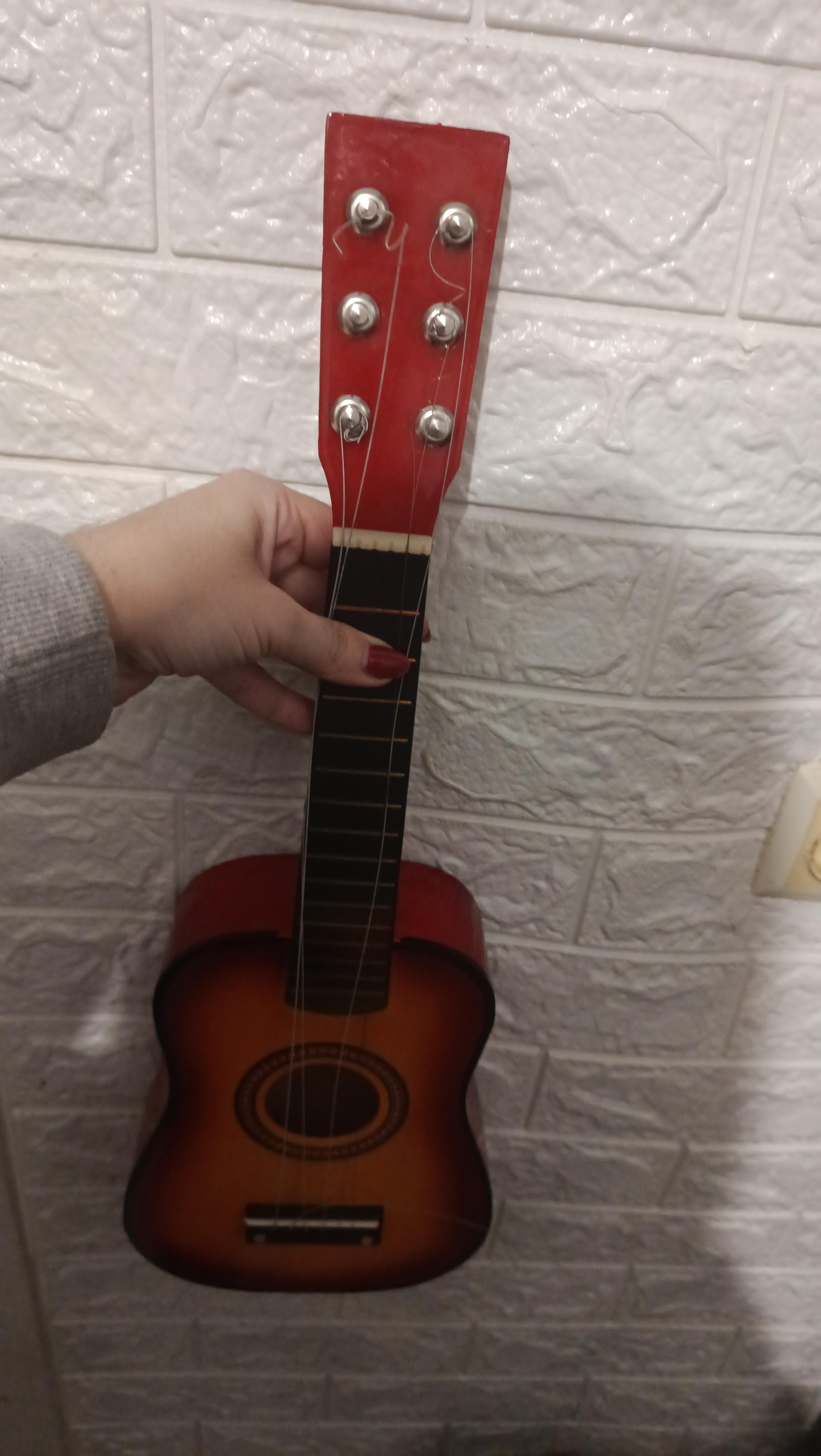 Фото: Гитара детская игровая дерево 6 шт. струн 58 см Синий (1369), отправлено покупателем Наталія Гитара детская игровая дерево 6 шт. струн 58 см Синий (1369) в реальных условиях использования от покупателя Наталія.