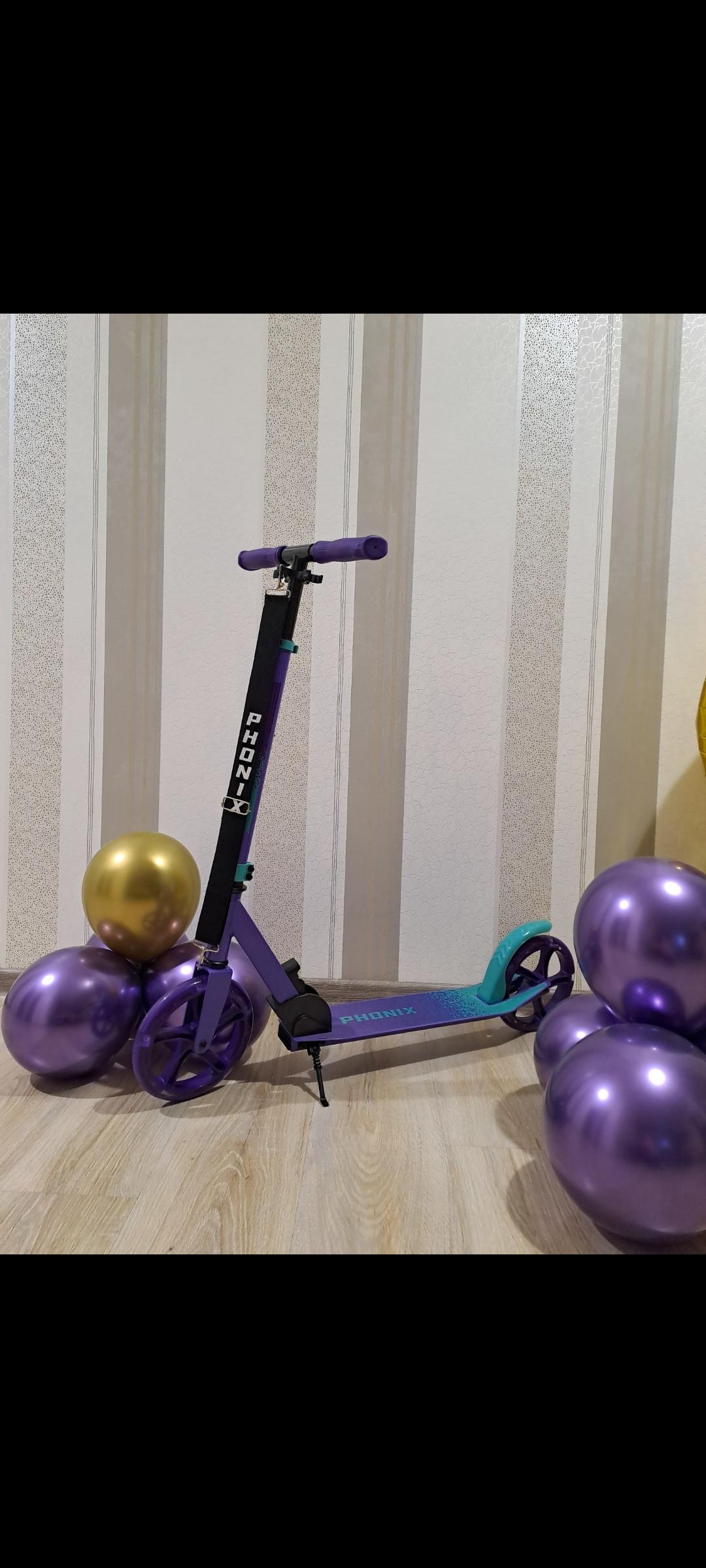 Фото: Самокат Maraton Phonix двухколесный с ремнем для переноски колеса светящиеся Фиолетовый, отправлено покупателем Марина Устименко Устименко Самокат Maraton Phonix двухколесный с ремнем для переноски колеса светящиеся Фиолетовый в реальных условиях использования от покупателя Марина Устименко Устименко.