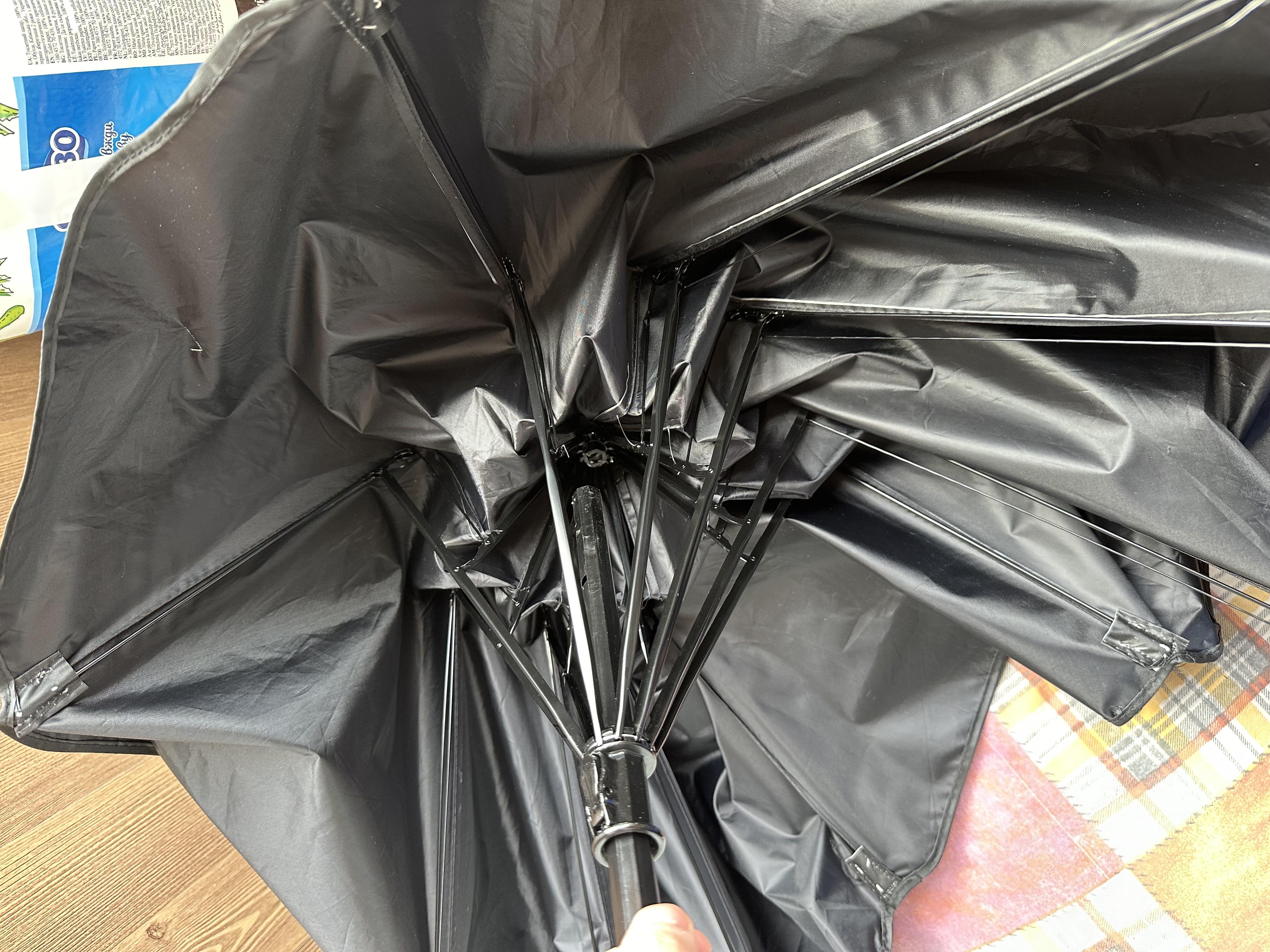 Парасолька для захисту салону автомобіля від сонця у реальних умовах використання від користувача Вадим.