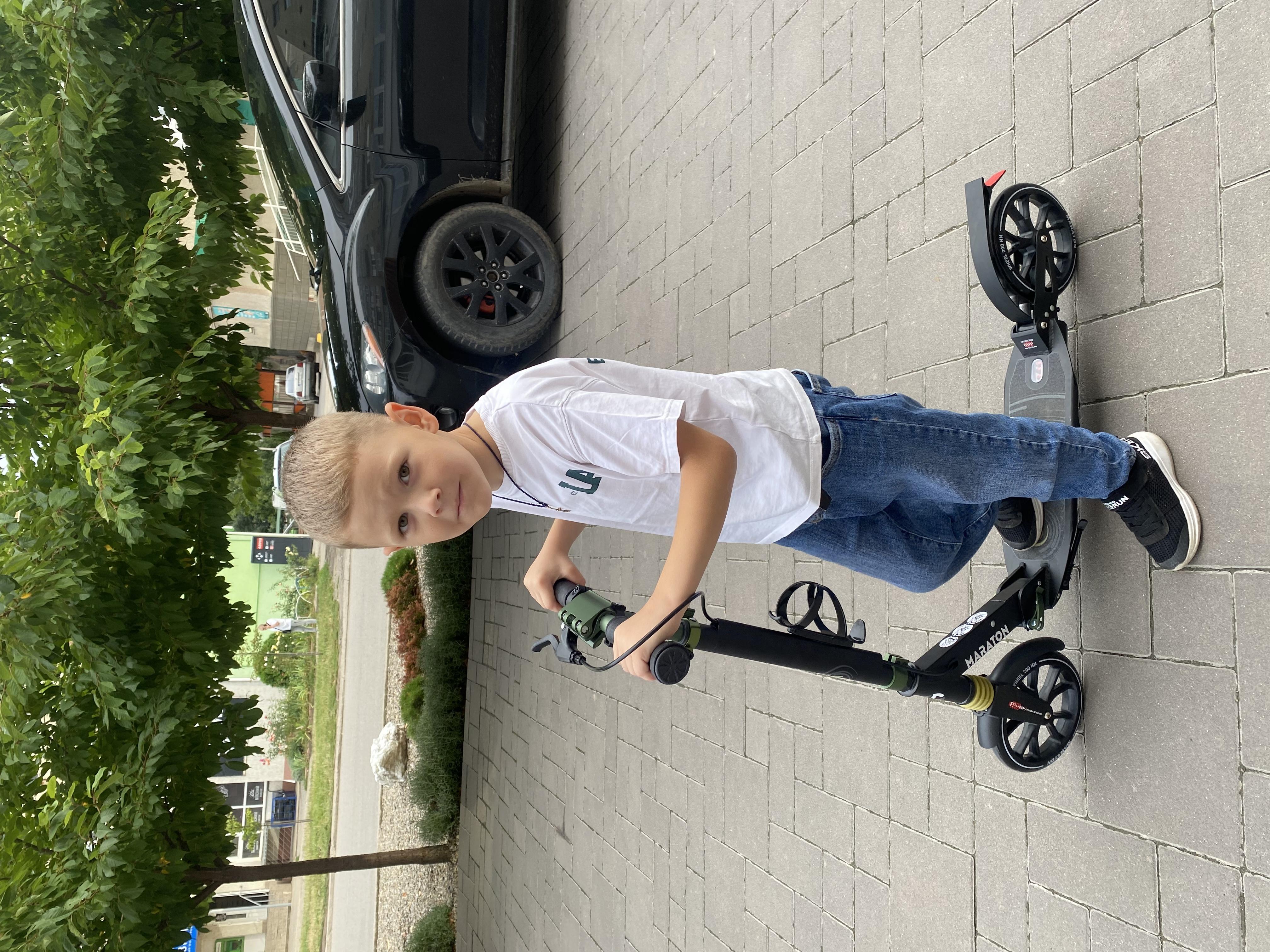 Фото: Самокат Maraton Decider з ременем Білий, надіслане покупцем Наталія Самокат Maraton Decider з ременем Білий у реальних умовах використання від покупця Наталія.