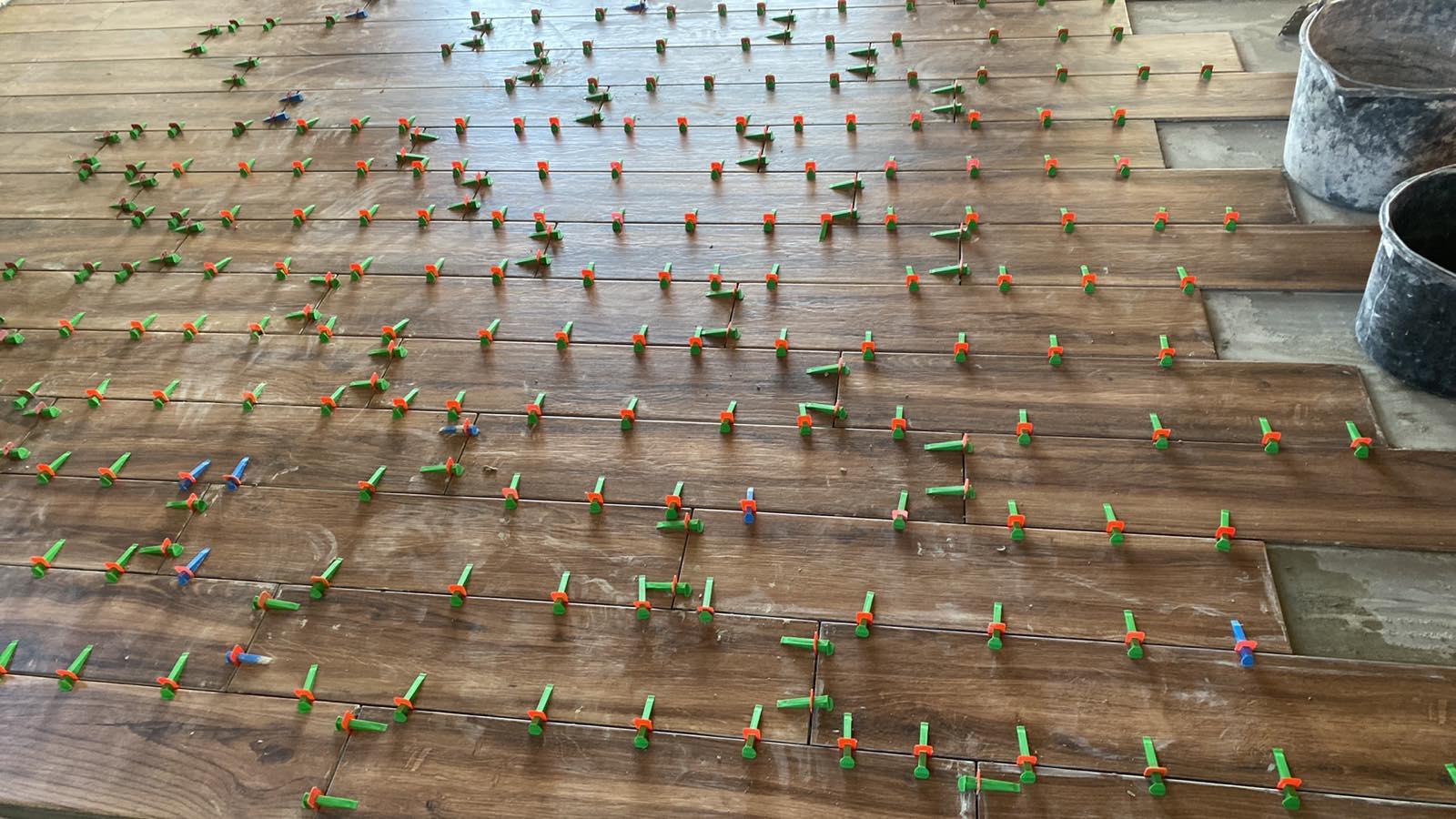 Система выравнивания плитки BauGut 2 мм 250 шт в реальных условиях использования от пользователя Олександр.