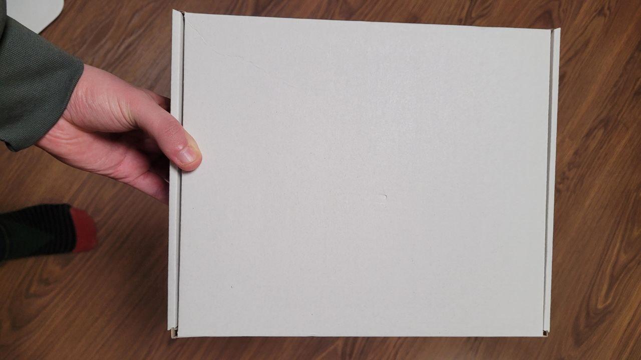 Подарунковий бокс свічка натуральна ручної роботи з ароматом печива 3 шт./іграшка на ялинку Гном 2 шт./гірлянда на USB 2 м (22905269) у реальних умовах використання від покупця Артур.