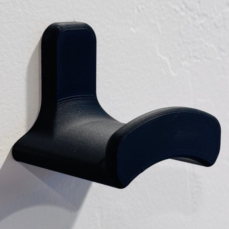 Тримач настінний для навушників із прихованим кріпленням пластик Чорний