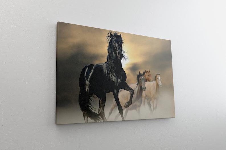 Картина на холсте KIL Art Черный жеребец и лошади 81x54 см (103)