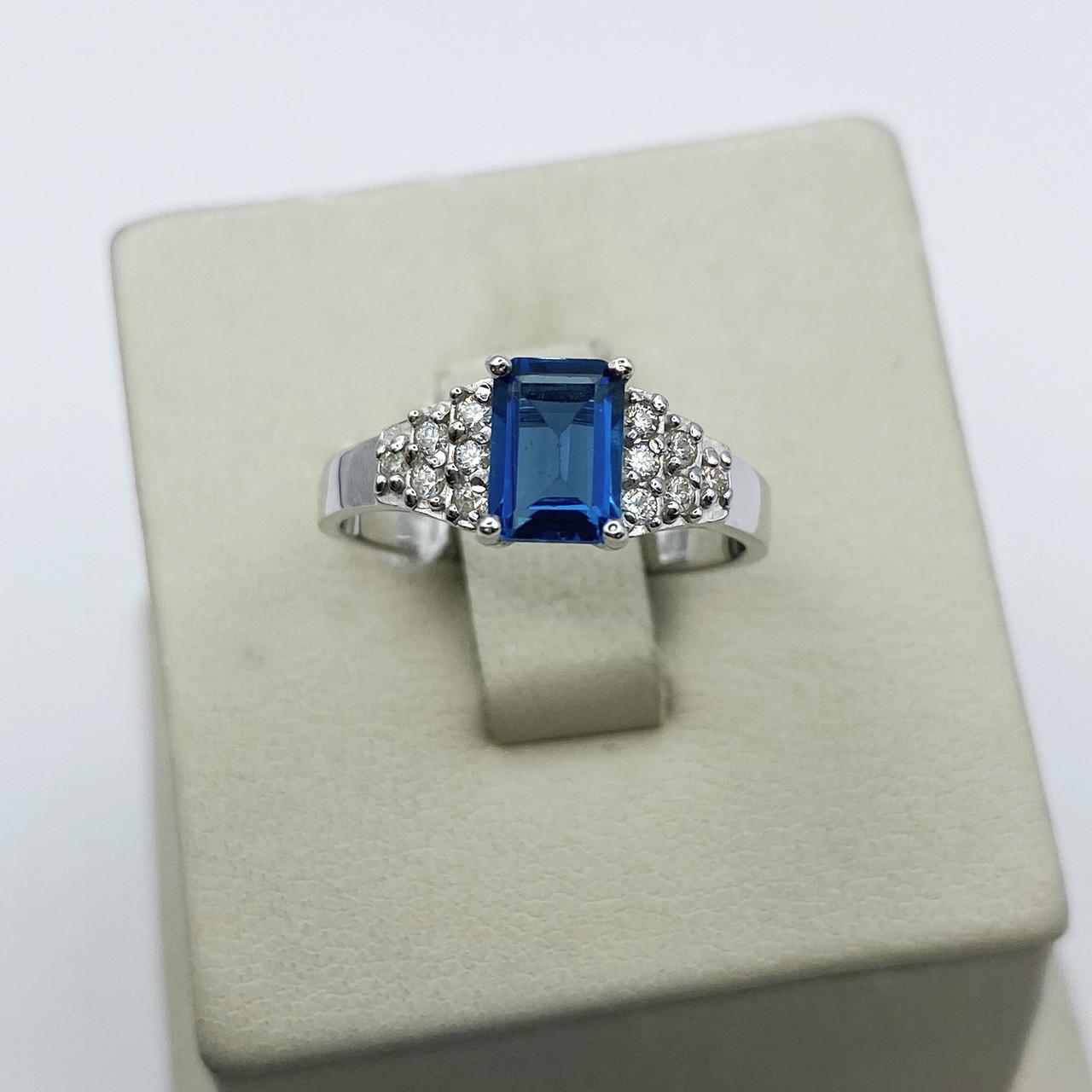 Кольцо серебряное с лондон топазом и кубическим цирконием р. 17 2,53 г (1938255905)