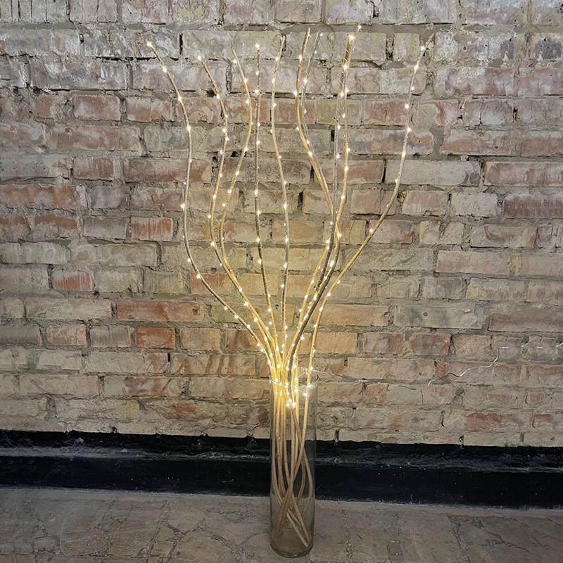 Декоративна лоза незабарвлена з прикрасою у вигляді гірлянди