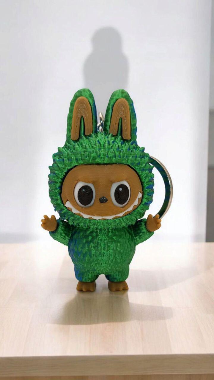 Брелок Лабубу 3Д пластиковый Зелено-синий (27472030) Брелок Лабубу 3Д пластиковый Зелено-синий (27472030)