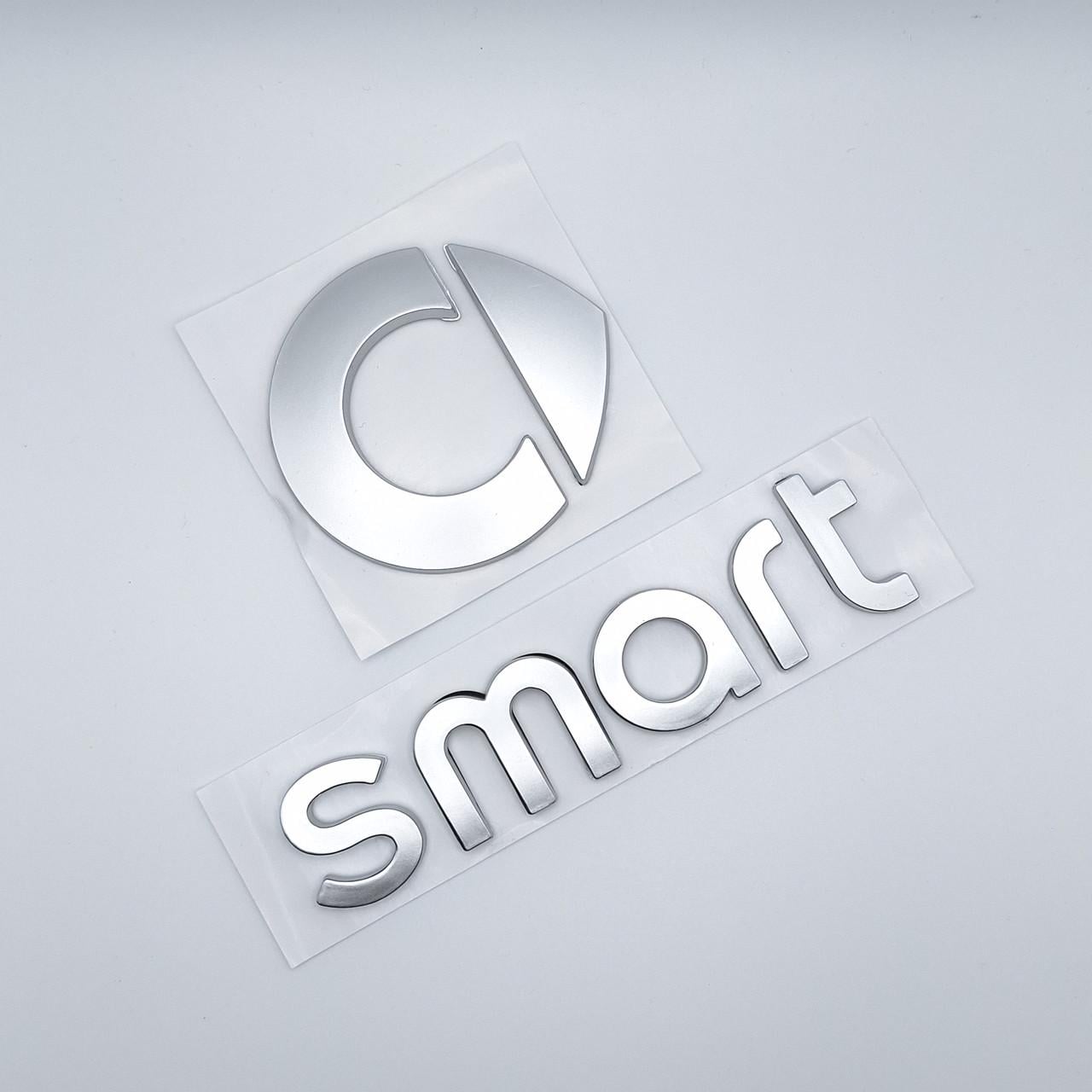 Эмблема Smart металл 11,5х10 см Хром матовый (1996660996)