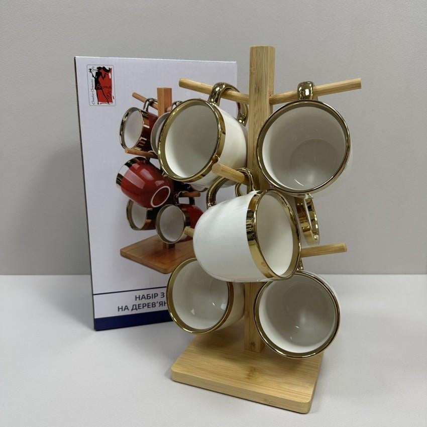 Набір порцелянових чашок на бамбуковій підставці Bona Di 905-221 Золота лінія 320 мл 6 шт. Білий